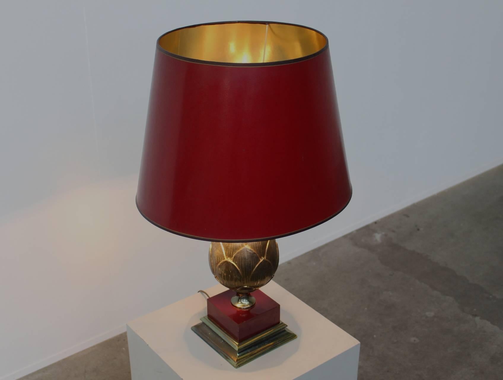 Completely original with it's original red shade with golden inside which is very rare stunningly beautiful large table lamp featuring a golden artichoke. A wonderful and very rare example of the french luxuary style that Maison Charles always oozes.