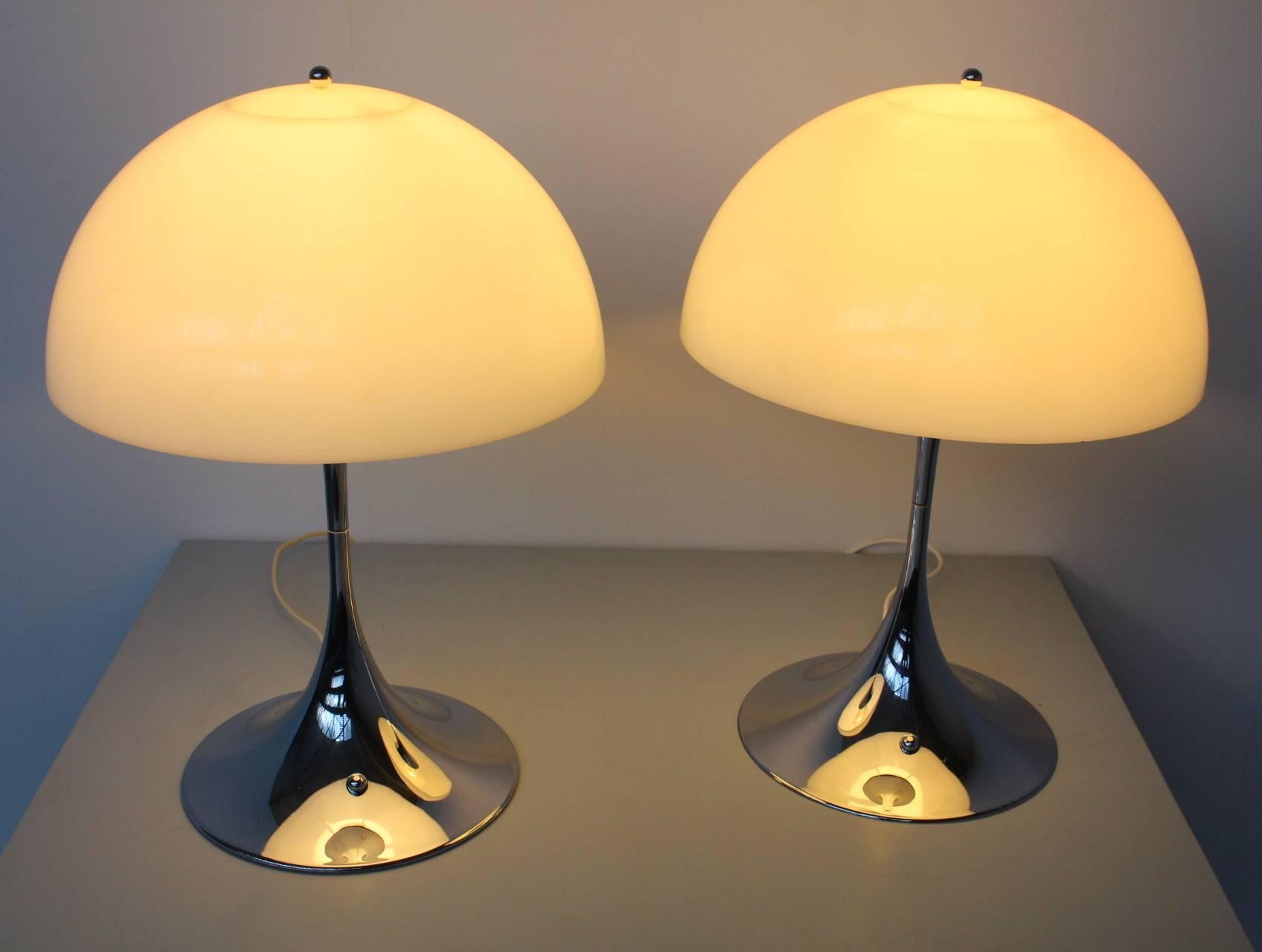 Louis Poulsen manufactured very few of the Panthella lights designed by Verner Panton in another color than white. The design is based on the mushroom cloud resulting from a nuclear explosion. This pair features the rare combination of chromed base