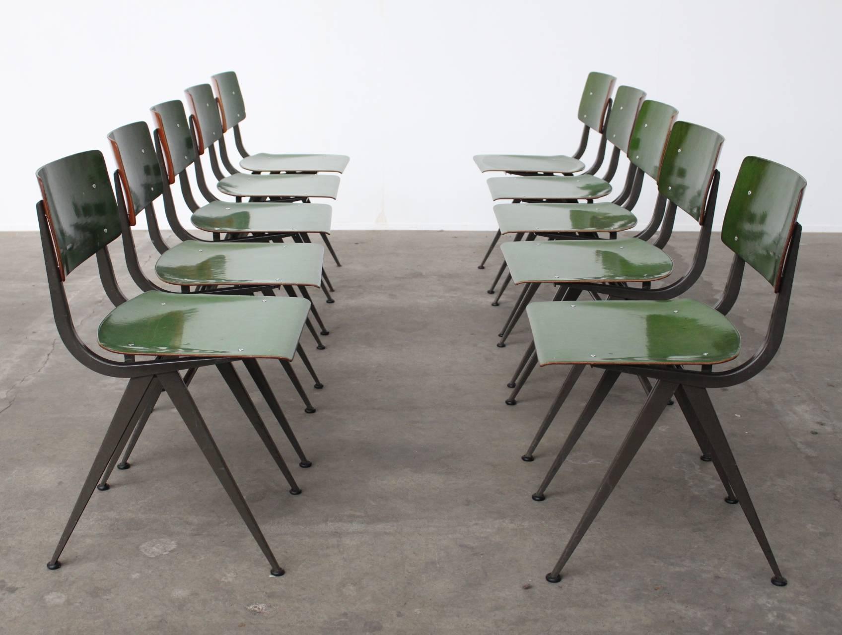 Wonderful set of ten green lacquered (only the front side) Industrial compass chairs by the Dutch furniture factory Marko. These chairs are spray painted in a very unusual green; as a bespoke ordered request to the factory, therefore extremely rare