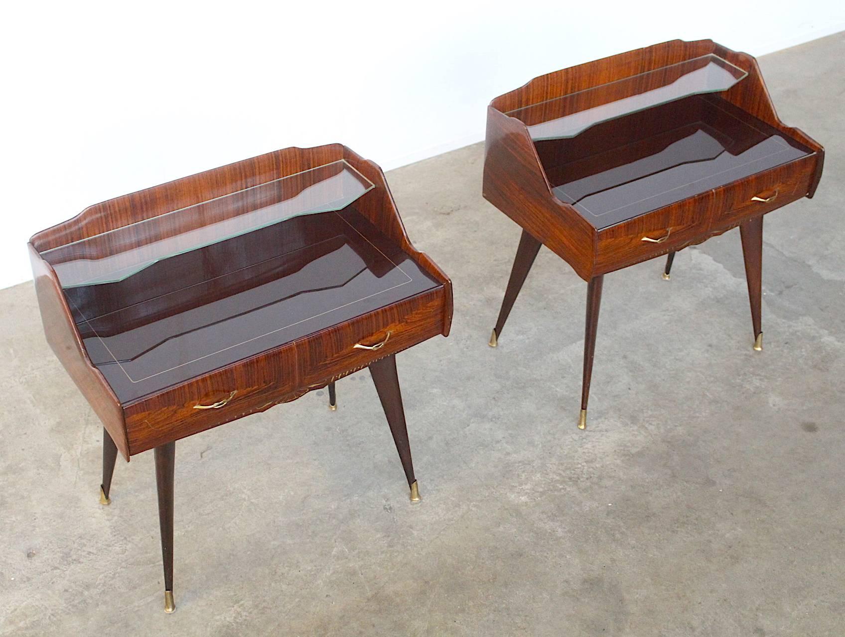 Very exquisite set of two beautifully carved nightstands or side tables executed in Fine rosewood. The size is typical -the nightstands are uncommonly wide, which makes them stand out and being very elegant and eye-catching. Also the glass tops are