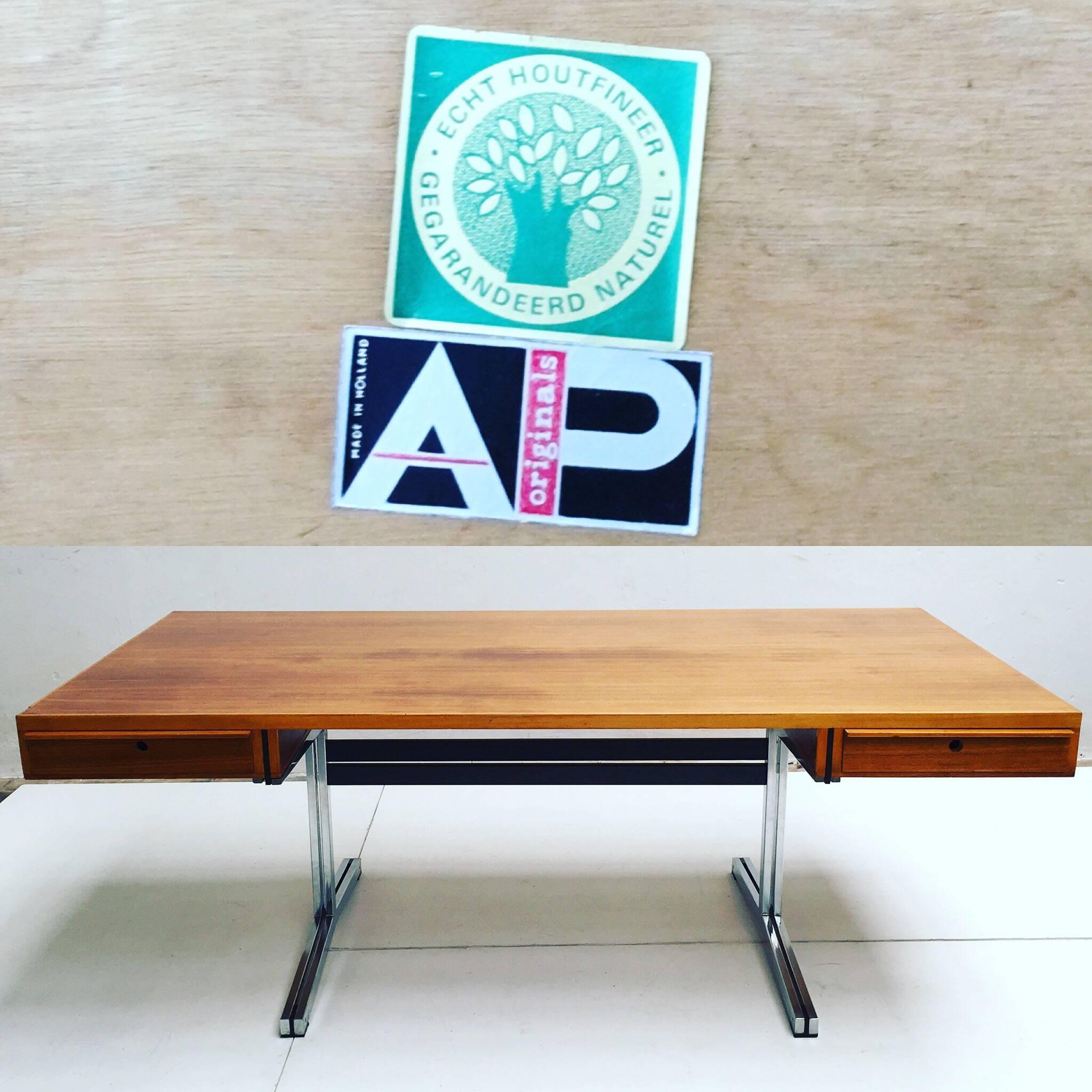 Elegant 1960s executive's desk by Dutch designer Theo Tempelman produced by 'A Polak', The Netherlands. Marked with original manufacturer's labels.

An extremely sleek design which despite the desk's significant size gives a quality of lightness.