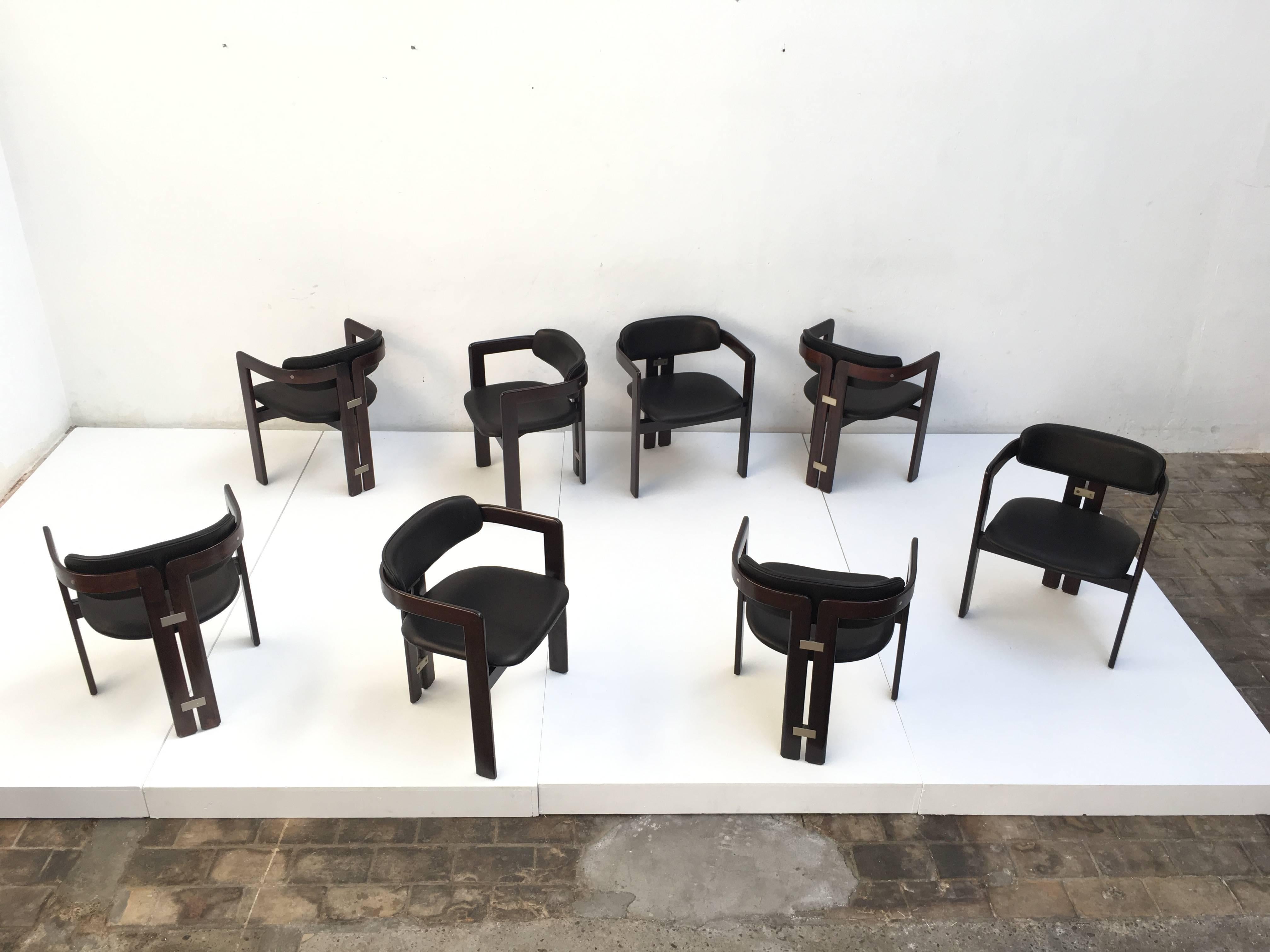 Superb and very rare set of eight 'Pamplona' dining chairs by Italian master designer Augusto Savini for Pozzi, Italy 1965. The Pamplona chair has a refined sculptural form reminiscent of the elegant forms and detailing created by Italian master