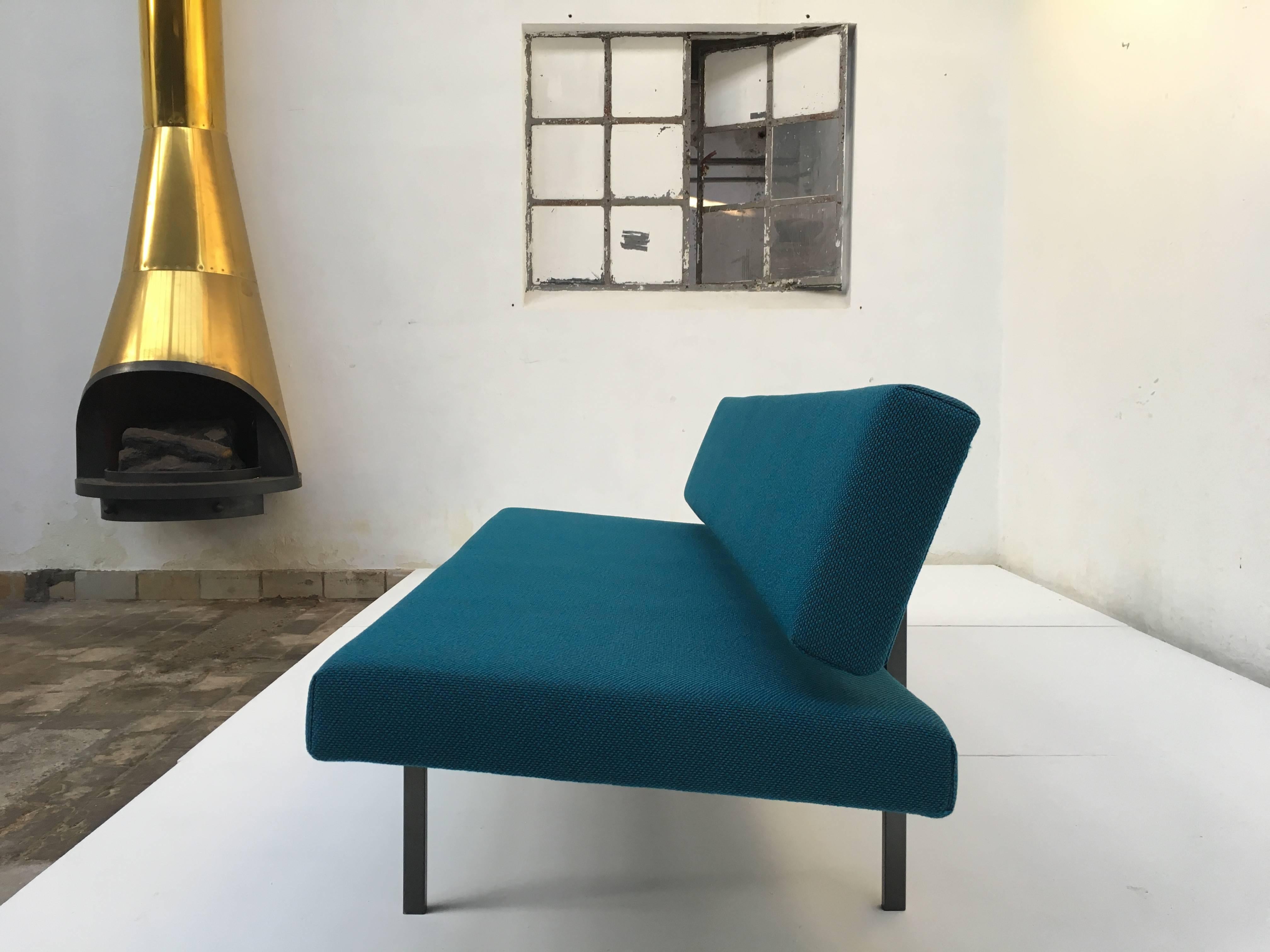 This sleeping sofa in the style of Martin Visser was produced bij Dutch manufacturer van der Sluis in the 1960s.

The seating part can be pulled out to make a bed for guests.

Dutch functional design with a sleek Industrial look.

We