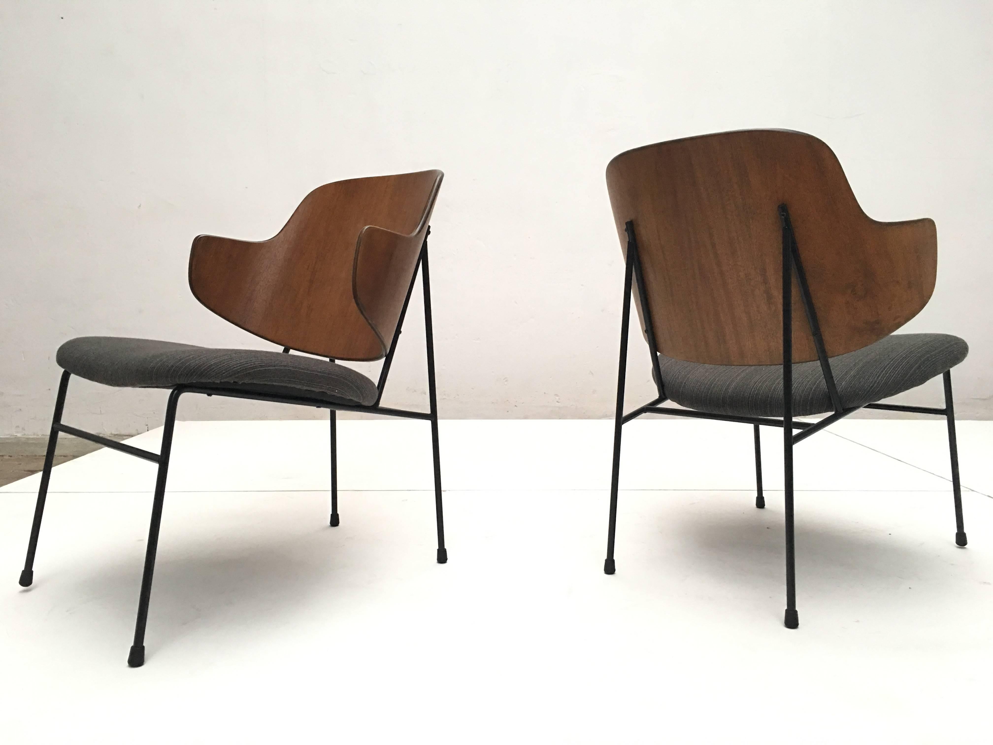 Lovely pair of easy chairs by Danish designer Ib Kofod-Larsen 

The chairs have been fully restored with refurbished plywood and metal frame and new upholstery

We got these chairs from a beautiful mid century modern house by architect Gene
