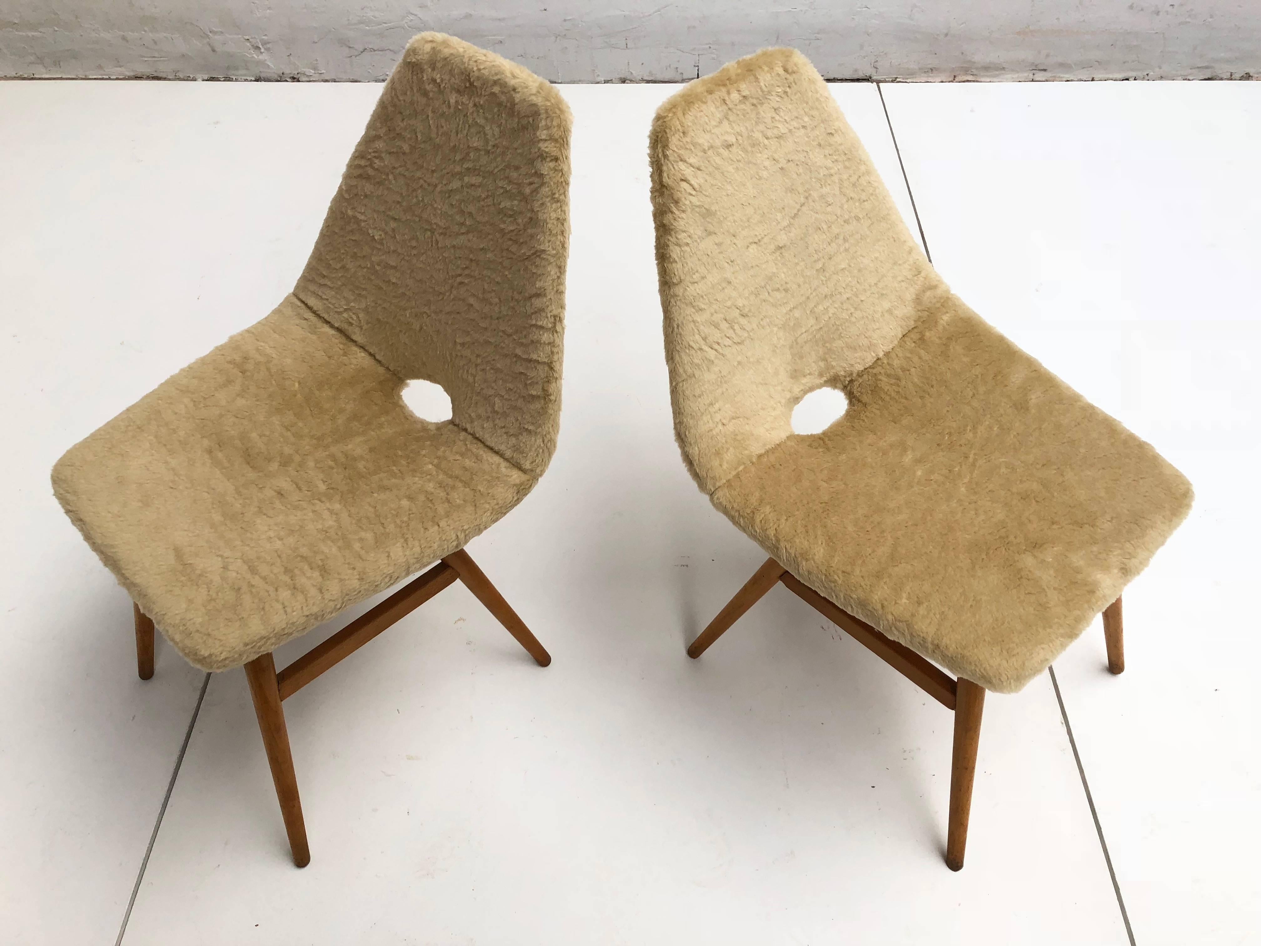 Pair of side chairs by Judit Burian & Erika Szek made in Hungary, circa 1959

Very much inspired by the works of Italian (Augusto Bozzi, Vittorio Nobili) and French (Pierre Guariche) contemporary designers of that era

A very elegant and