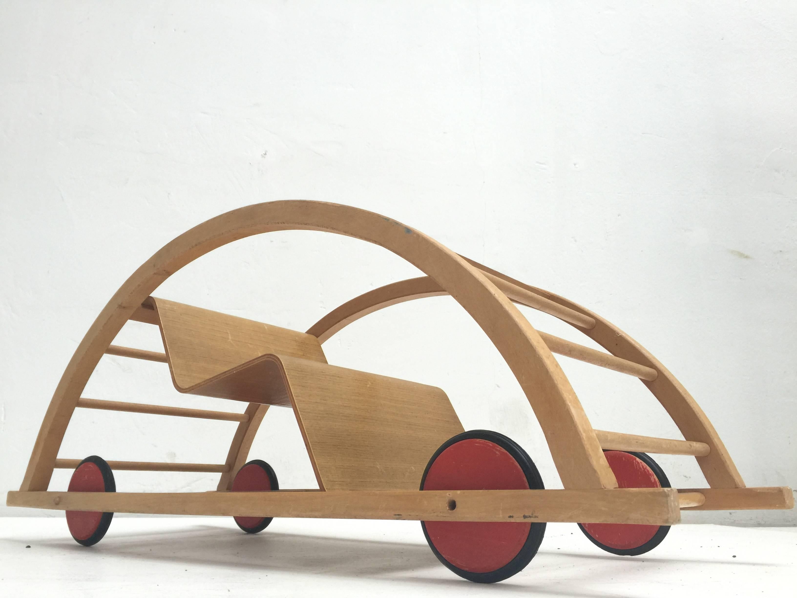 This ingenious design for children is from German (DDR) designers Hans Brockhage and Erwin Andra made in the early 1950's

Hans Brockhage (1925-2009) was wounded in WWII and started a study as sculptor in 1945 in Dresden were he got educated by