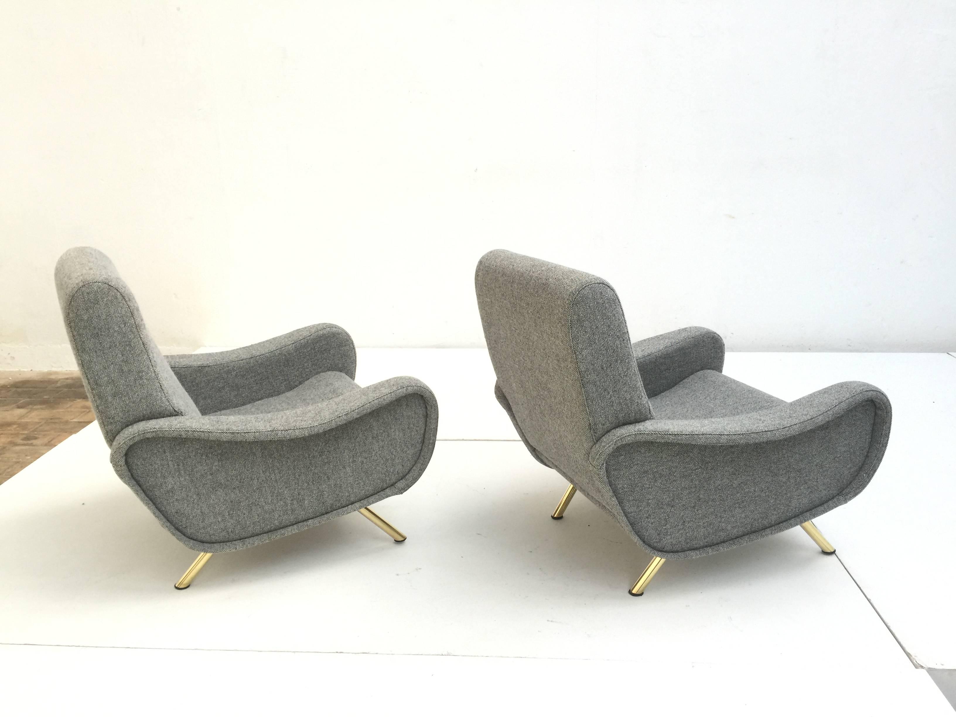 Superb pair of fully restored, iconic 'Lady' lounge chairs designed by Marco Zanuso for Arflex, Italy in 1951. This design won the Gold Medal prize at the 1951 'IX Triennale' international design exhibition in Milan.

The entire cover page of