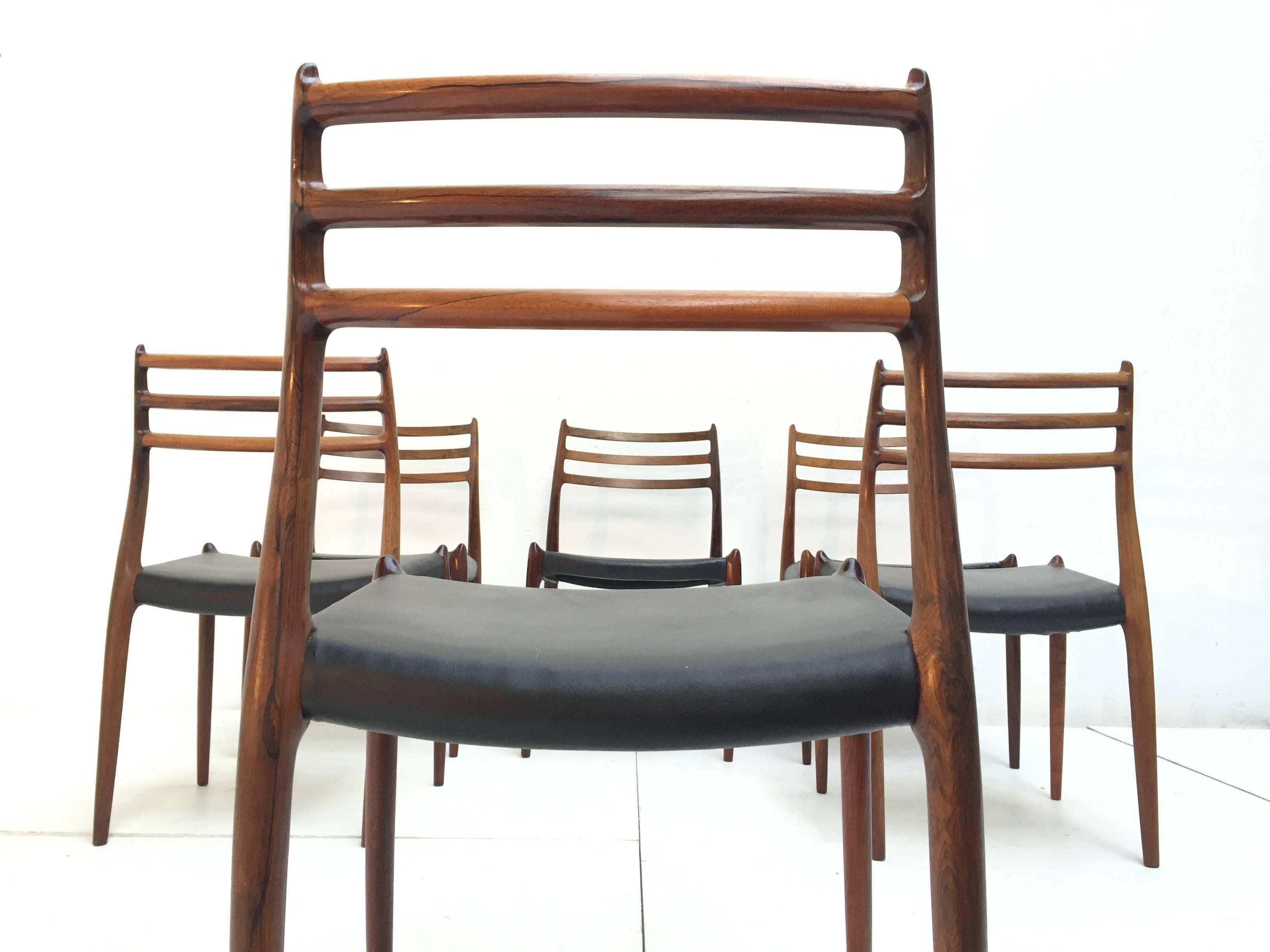 Stunning and hard to find set of 6 Danish midcentury design iconic chairs from J L Møller company.

1st owner set purchased in 1964 in amazing original condition and retaining its original leather upholstery

There is a matching table to this