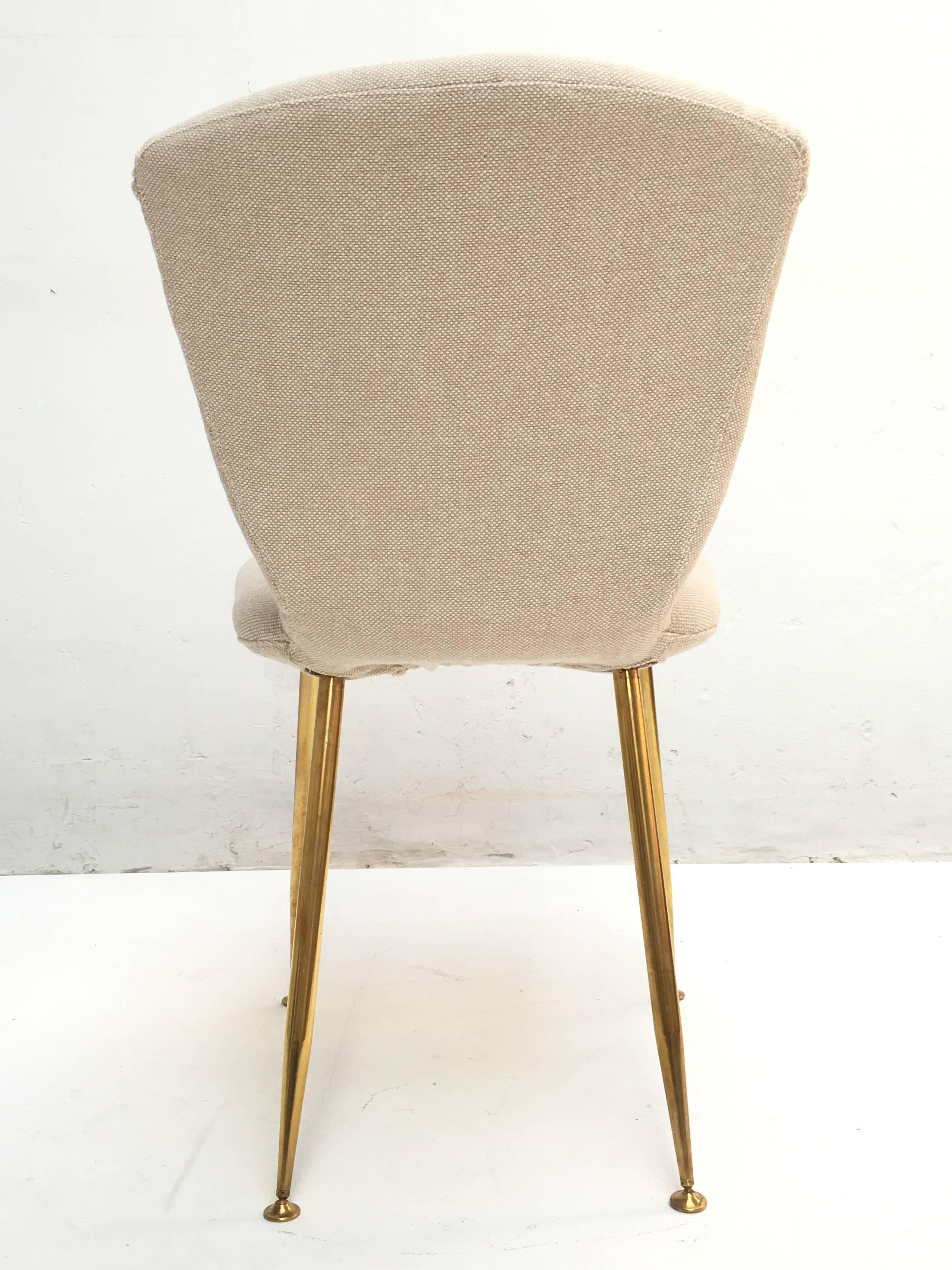 12 dining chairs by Louis Sognot for ARFLEX, 1959. Brass legs, Upholstery restored 3