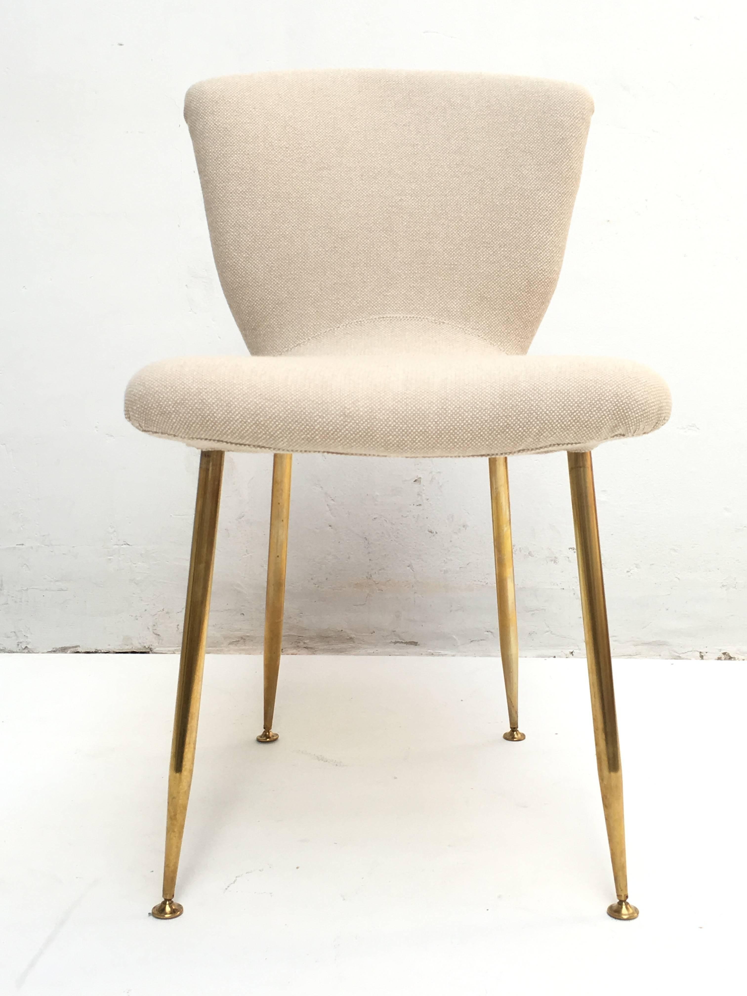 12 dining chairs by Louis Sognot for ARFLEX, 1959. Brass legs, Upholstery restored 2