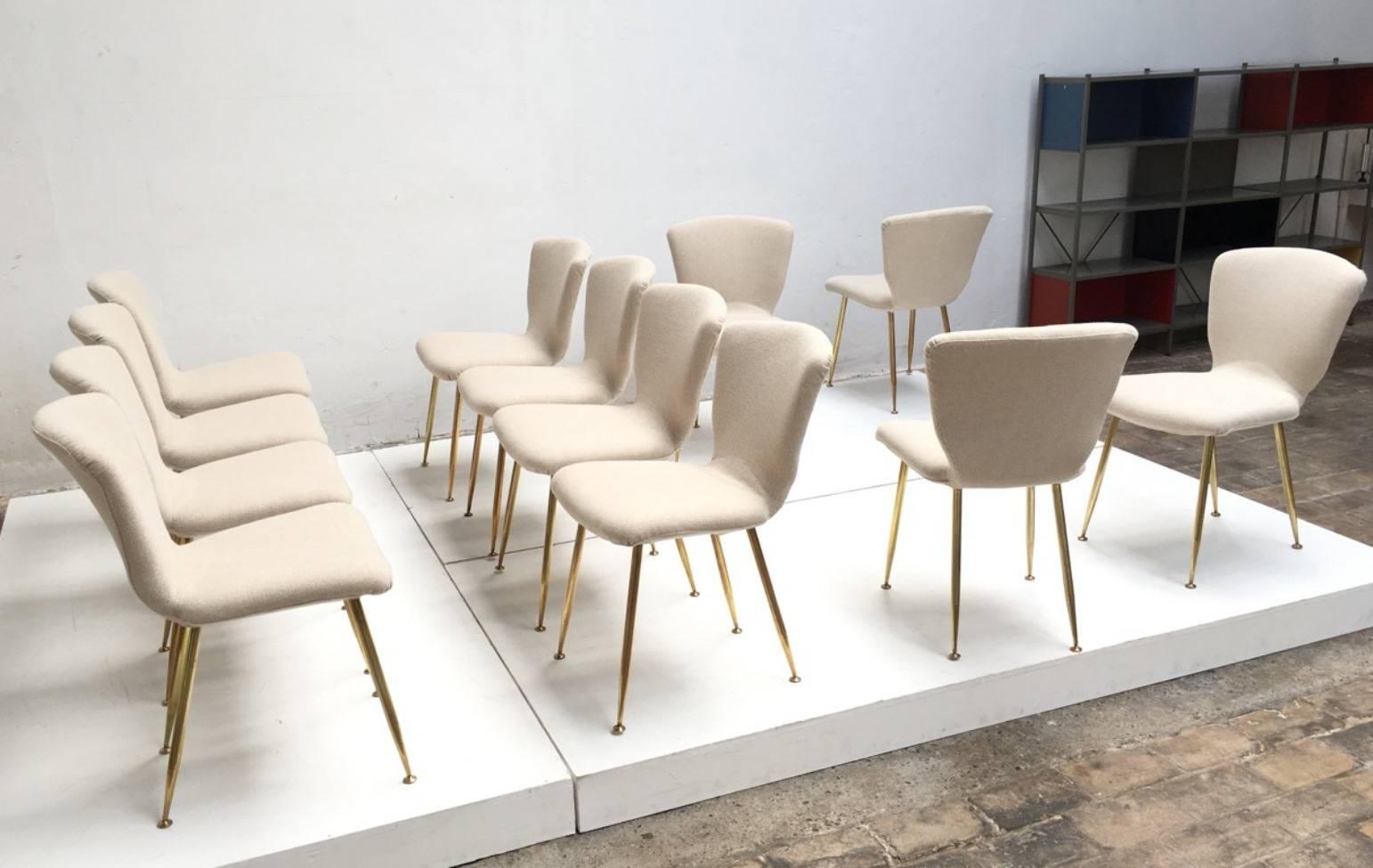 12 dining chairs by Louis Sognot for ARFLEX, 1959. Brass legs, Upholstery restored 1