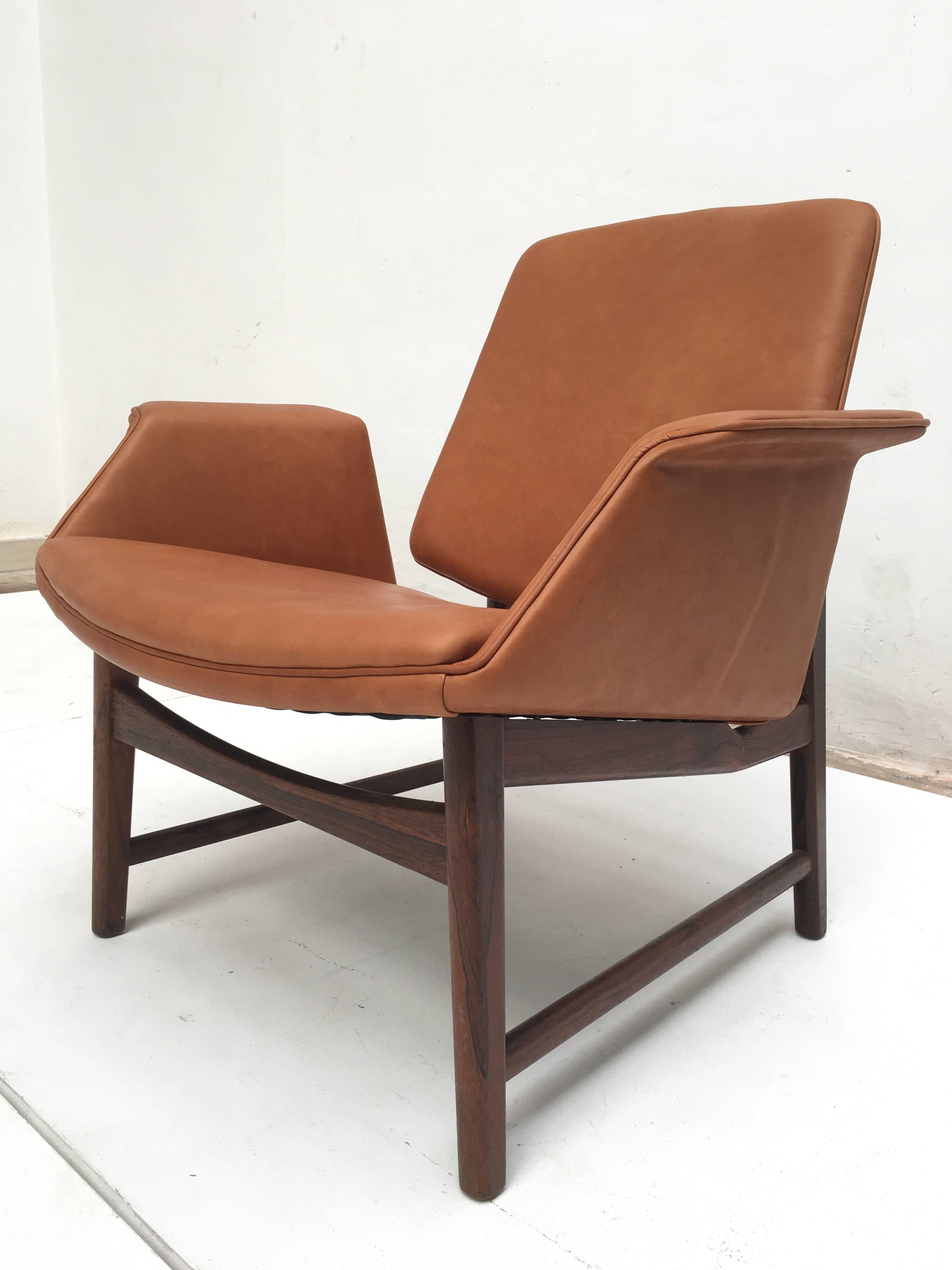 A very rare model by Danish designer Hans Olsen 

This example has undergone a complete restoration of its upholstery including new original specification Pirelli rubber webbing and new high quality and period authentic latex foam which is expensive
