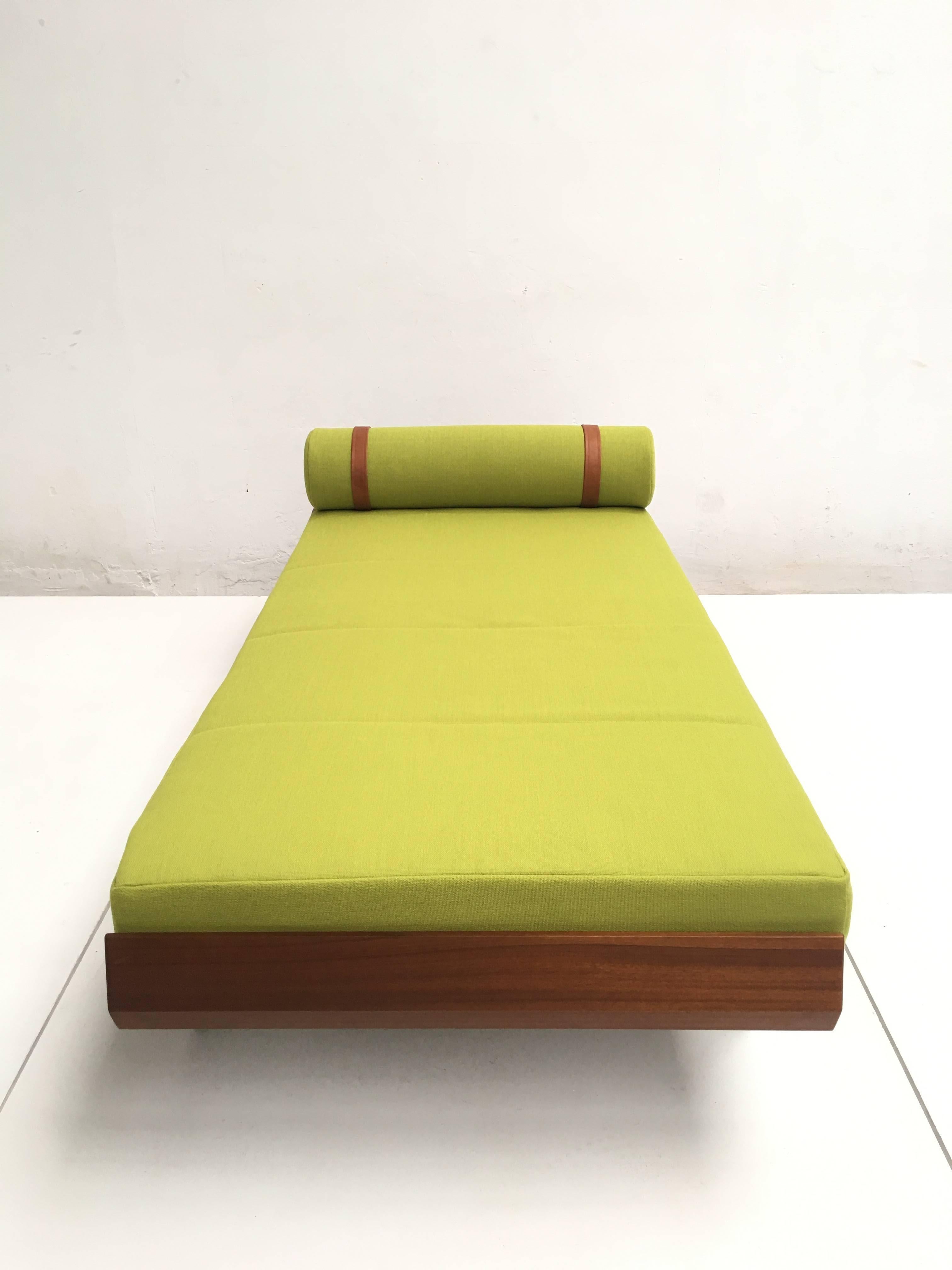 This rare model 165 daybed was manufactured in the early 1960s by Auping in The Netherlands

The design is most likely by A.R. Cordemeijer who also was responsible for the "Cleopatra' daybed that you find more common 

Other Famous Dutch