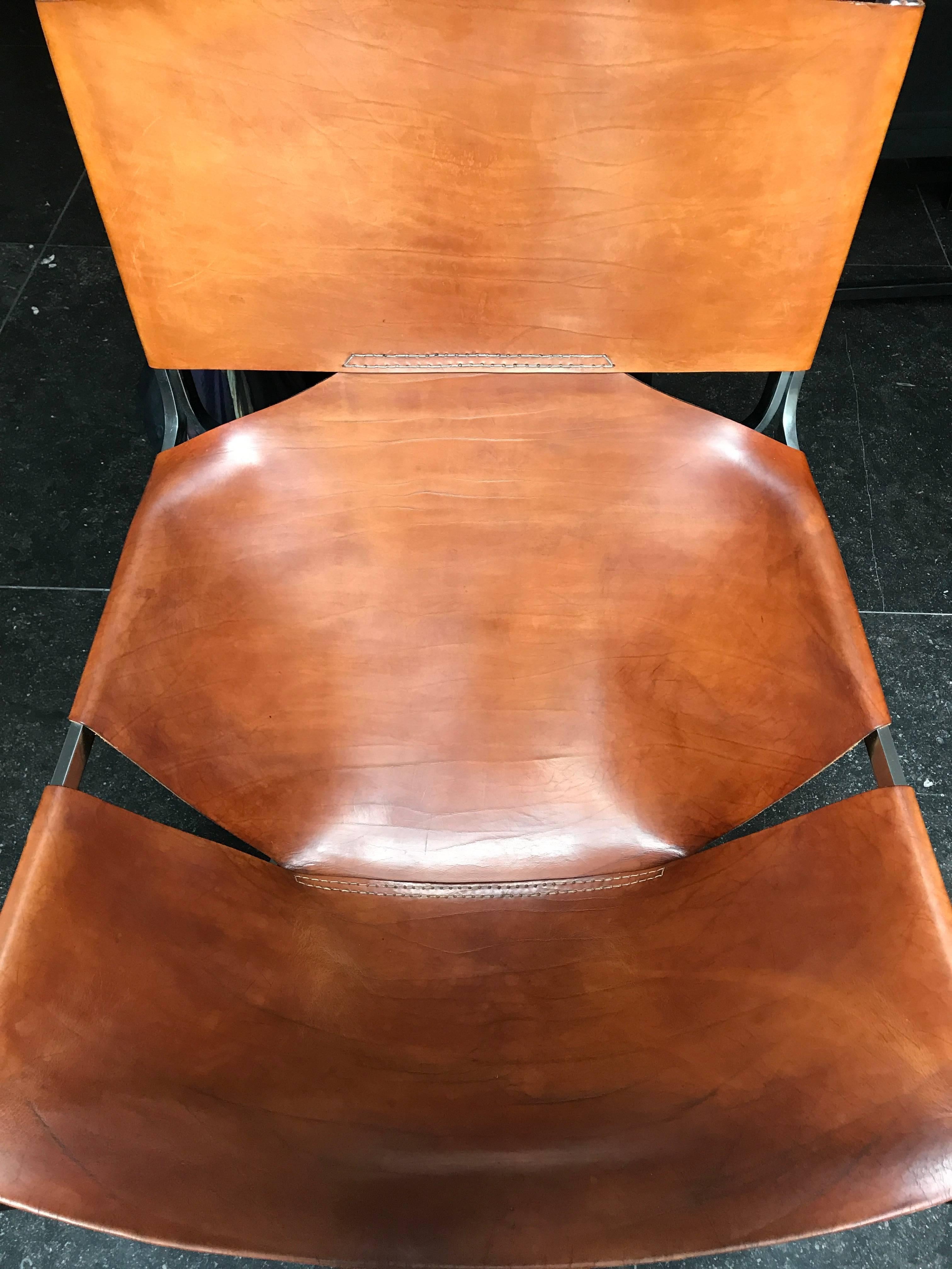 F444 lounge chair designed by Pierre Paulin (1927-2009) for Artifort in 1963

First edition F444 with very nice patinated and original brown saddle leather 
The original natural brown saddle leather was colored and stained by age and usage.
This