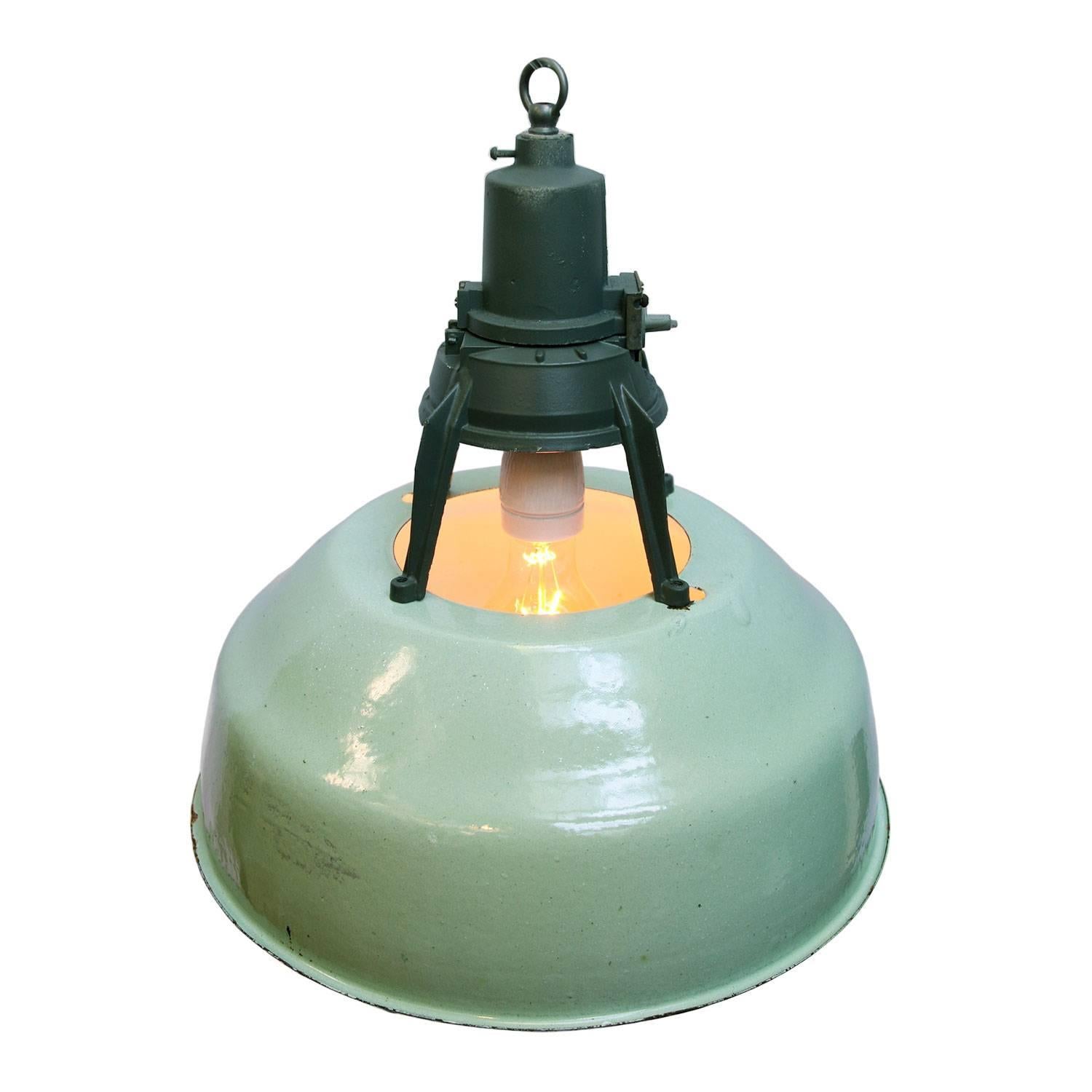 Enamel Industrial pendant. Green enamel shade, white inside.
Dark grey/green cast aluminium top.

All lamps have been made suitable by international standards for incandescent light bulbs, energy-efficient and LED bulbs with an E26/E27 socket,