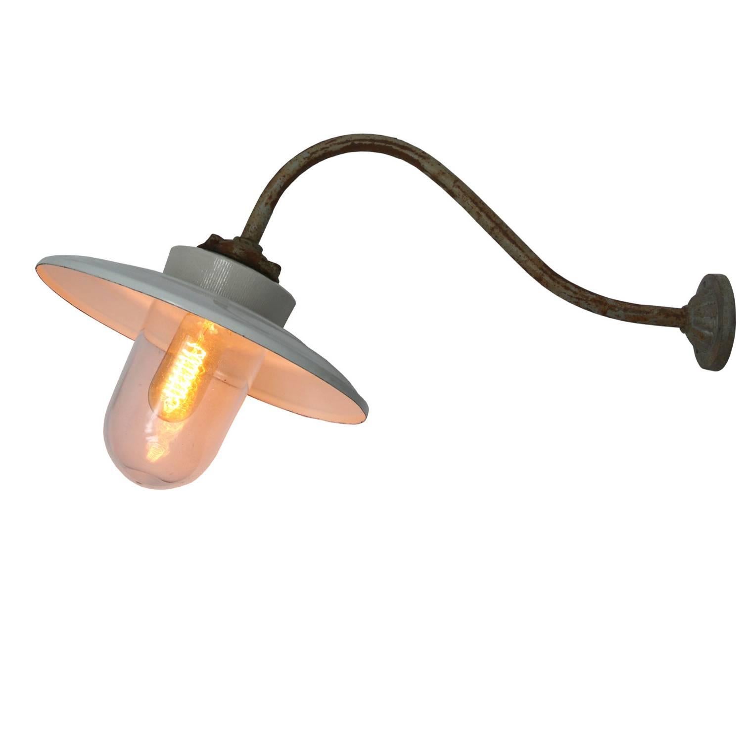 White enamel industrial wall light with white interior.
Cast iron and porcelain top, clear glass.
Diameter cast iron wall mount: 9 cm, 3 holes to secure.
All lamps have been made suitable by international standards for incandescent light bulbs,