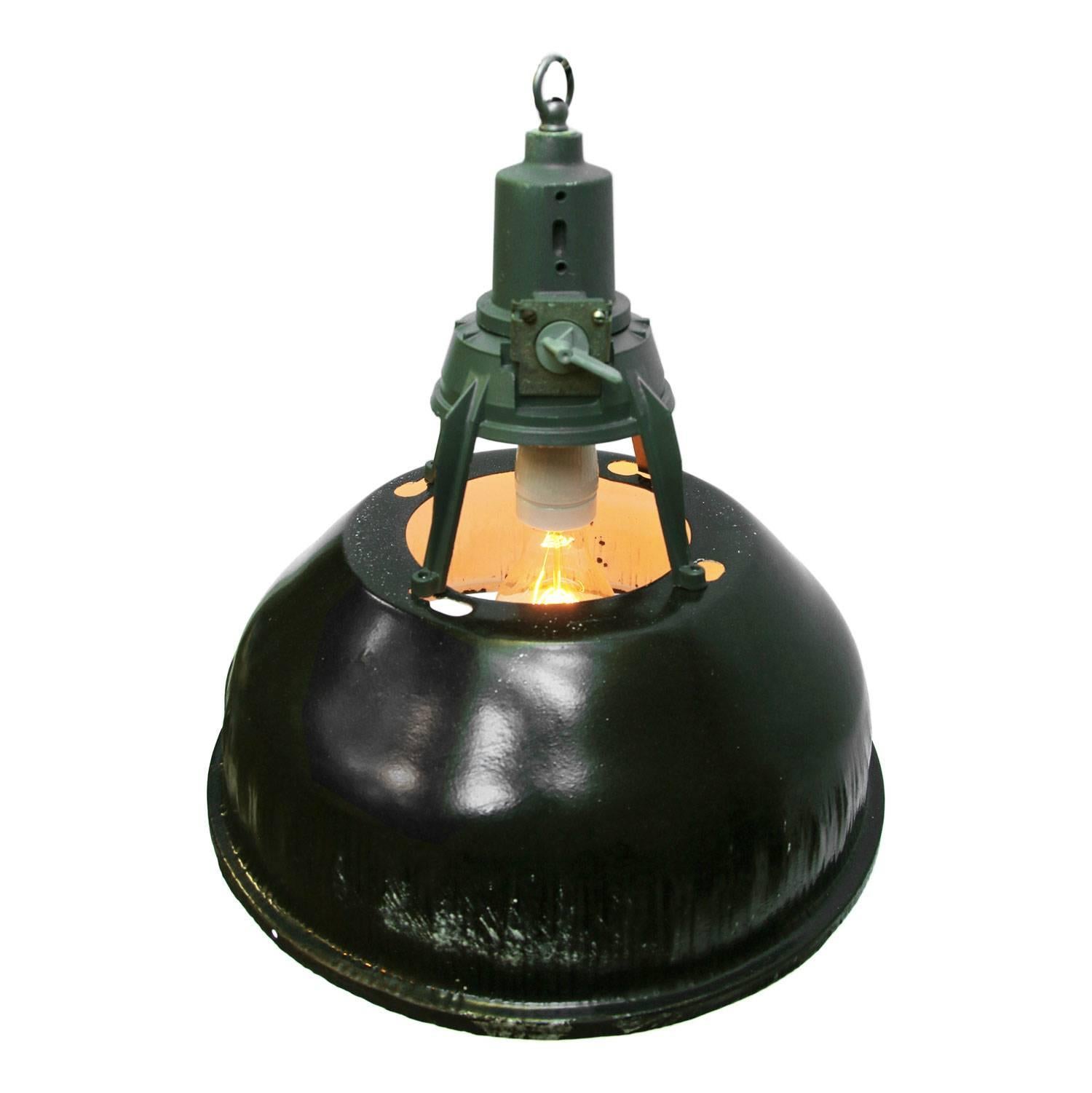 Enamel Industrial pendant. Black enamel shade, white inside.
Dark grey or green cast aluminium top.

Weight: 2.4 kg / 5.3 lb

All lamps have been made suitable by international standards for incandescent light bulbs, energy-efficient and LED