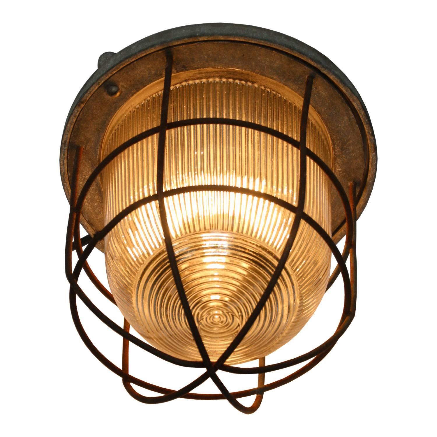 Hanging lamp with striped glass, green cast aluminum top.

Weight: 2.9 kg / 6.4 lb

All lamps have been made suitable by international standards for incandescent light bulbs, energy-efficient and LED bulbs. E26/E27 bulb holders and new wiring