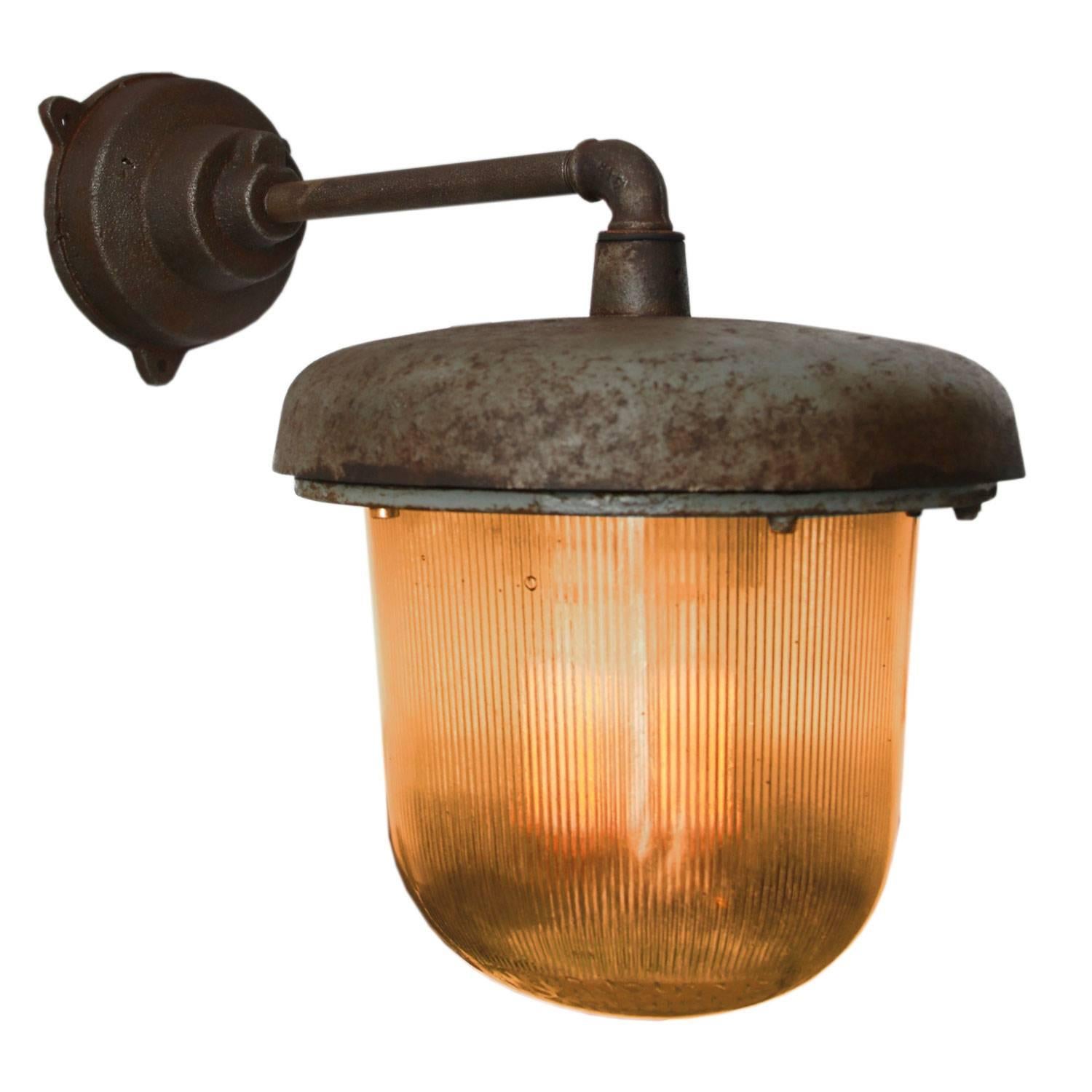 Cast iron Industrial wall light. Holophane glass. Diameter cast iron wall piece: 12 cm, 3 holes to secure. Maximum 150W E27.

Weight: 8.5 kg / 18.7 lb

All lamps have been made suitable by international standards for incandescent light bulbs,