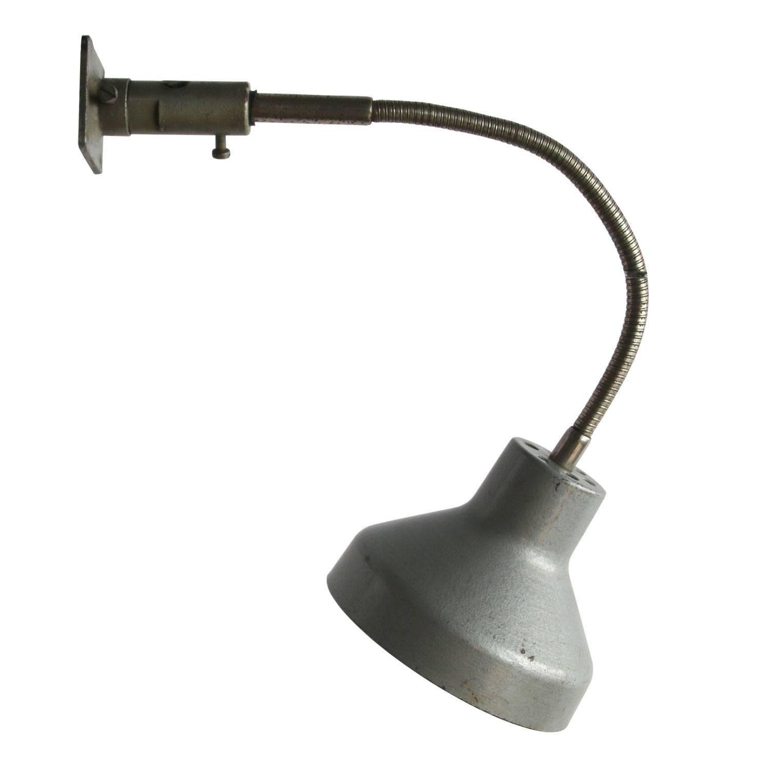 Pranie. Metal work light with flexible arm. Aluminium shade.
Size foot 6 × 6 cm.

Weight: 1.1 kg / 2.4 lb

All lamps have been made suitable by international standards for incandescent light bulbs, energy-efficient and LED bulbs. E26/E27 bulb