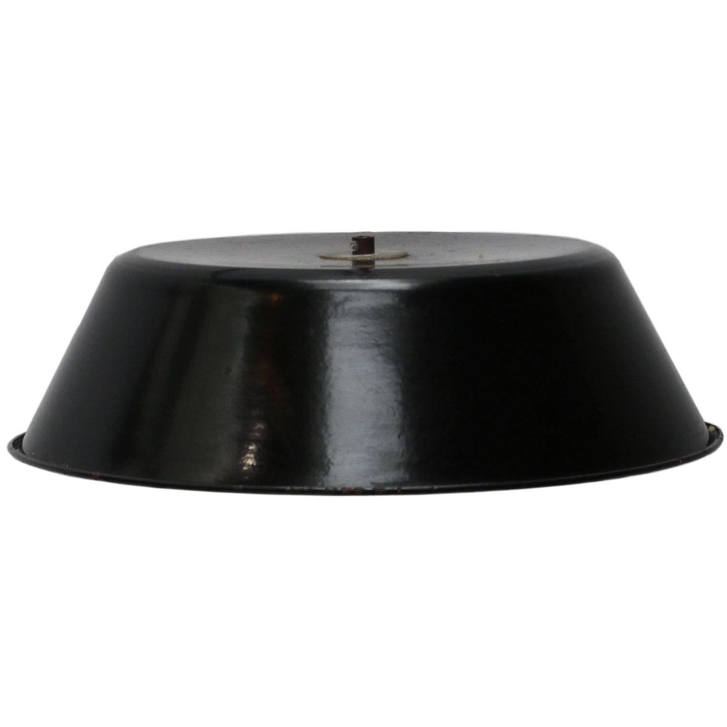 French Industrial pendant. Black enamel with white inside.

Measures: Weight 1.2 kg / 2.6 lb

Priced per individual item. All lamps have been made suitable by international standards for incandescent light bulbs, energy-efficient and LED bulbs.