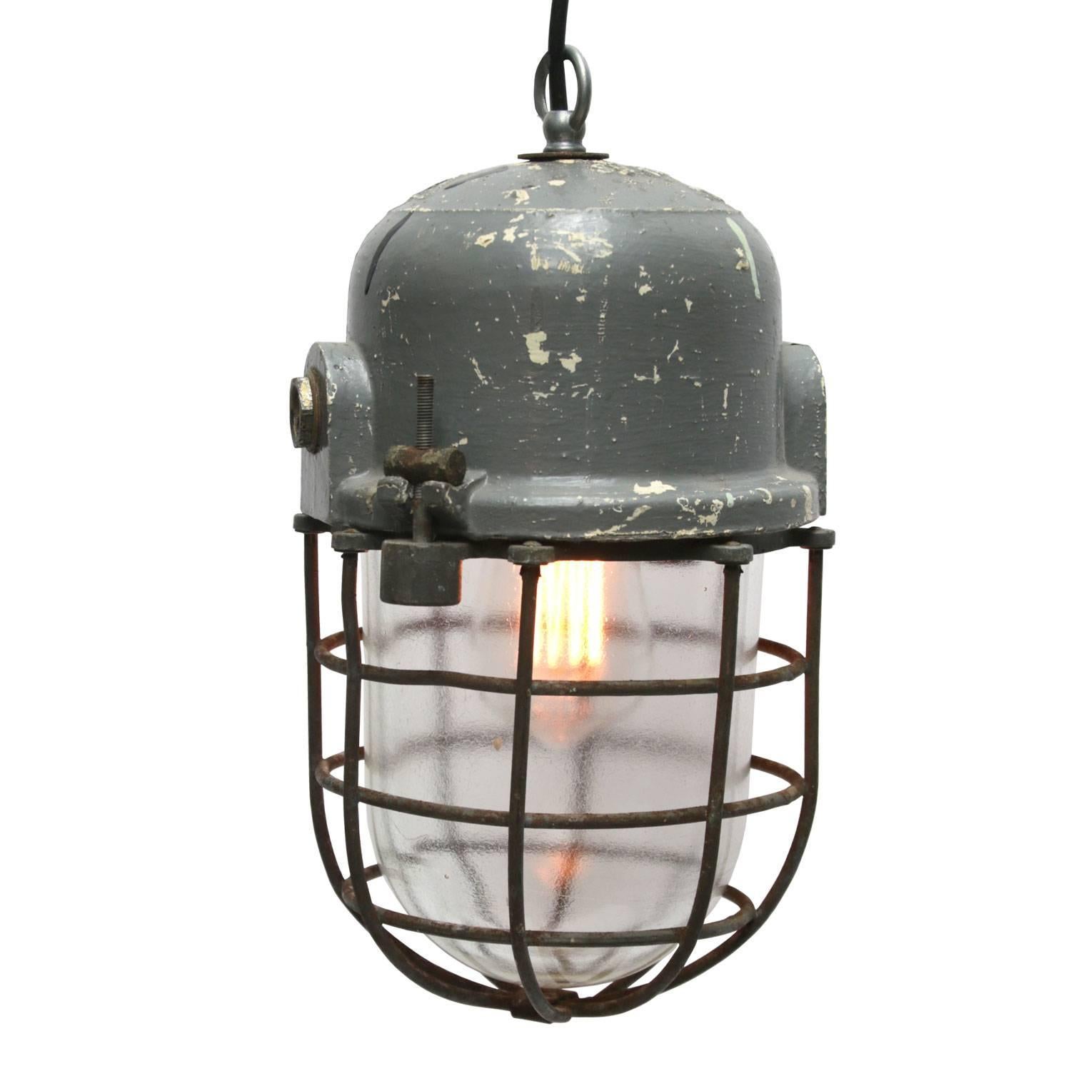 Vintage European Industrial pendant. Cast aluminium top. Clear glass.

Weight: 2.7 kg / 6 lb

All lamps have been made suitable by international standards for incandescent light bulbs, energy-efficient and LED bulbs. E26/E27 bulb holders and new