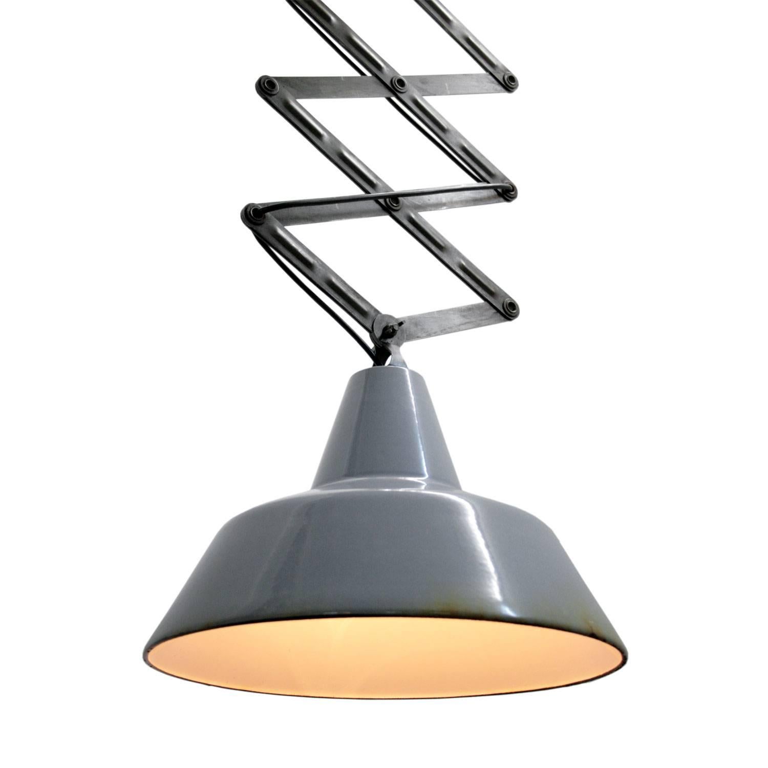 Scissor varia steel pendant. Grey enamel. White interior. Mounting plate: 12 × 7 cm.

Weight: 5.8 kg / 12.8 lb

Priced individual item. All lamps have been made suitable by international standards for incandescent light bulbs, energy-efficient and