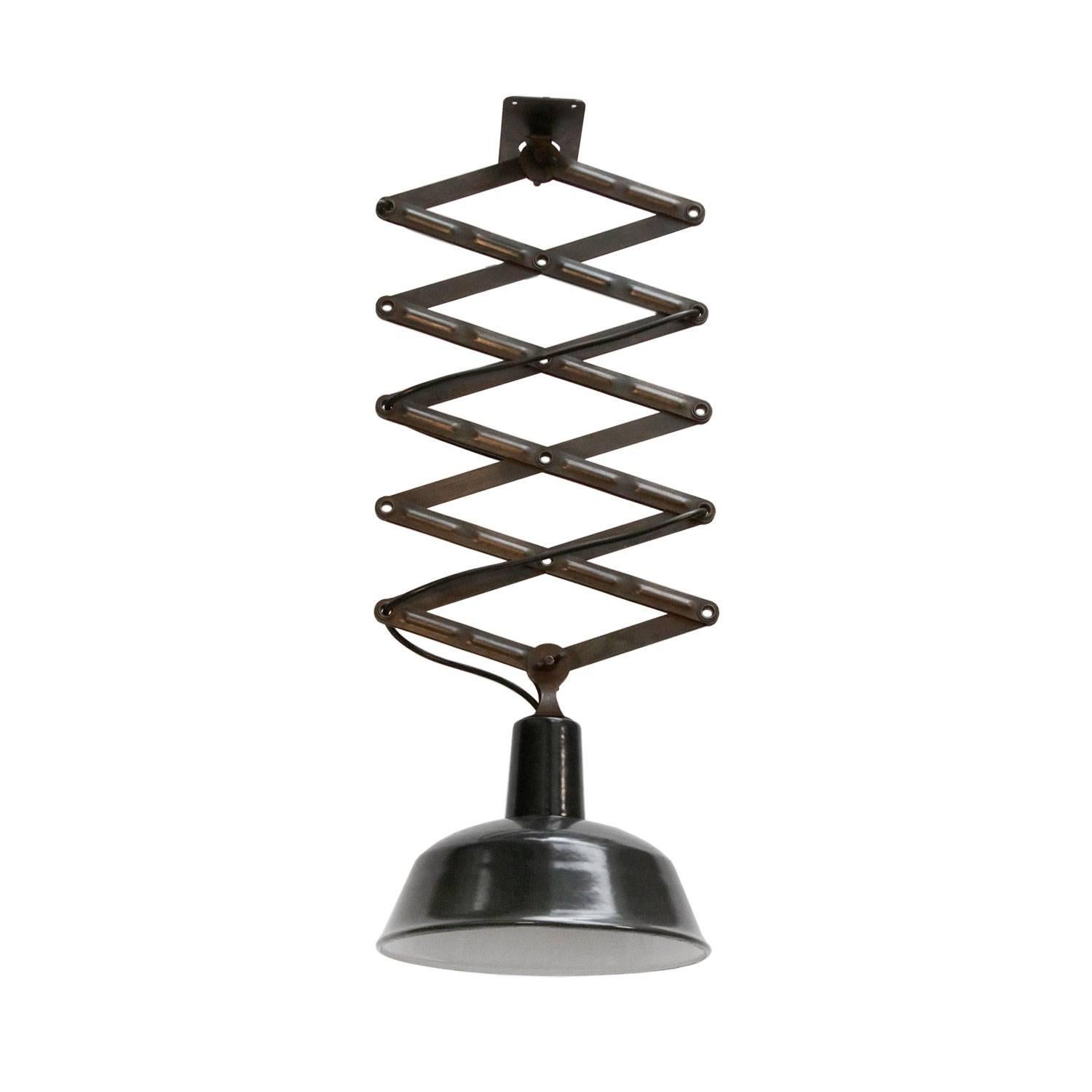 Scissor varia steel pendant.
Black enamel. White interior. Mounting plate: 12 × 7 cm.

Weight: 2.7 kg / 6 lb

All lamps have been made suitable by international standards for incandescent light bulbs, energy-efficient and LED bulbs. E26/E27 bulb