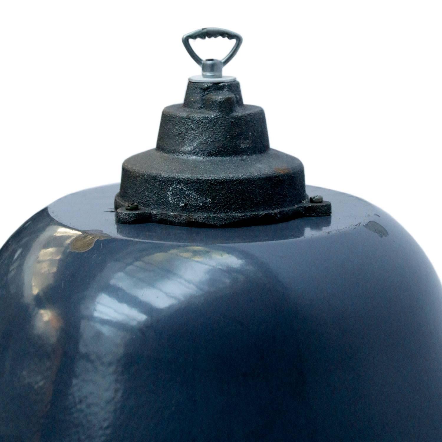 Factory pendant. Dark blue enamel with white interior.
Cast iron top.

Weight: 3.2 kg / 7.1 lb

All lamps have been made suitable by international standards for incandescent light bulbs, energy-efficient and LED bulbs. E26/E27 bulb holders and new