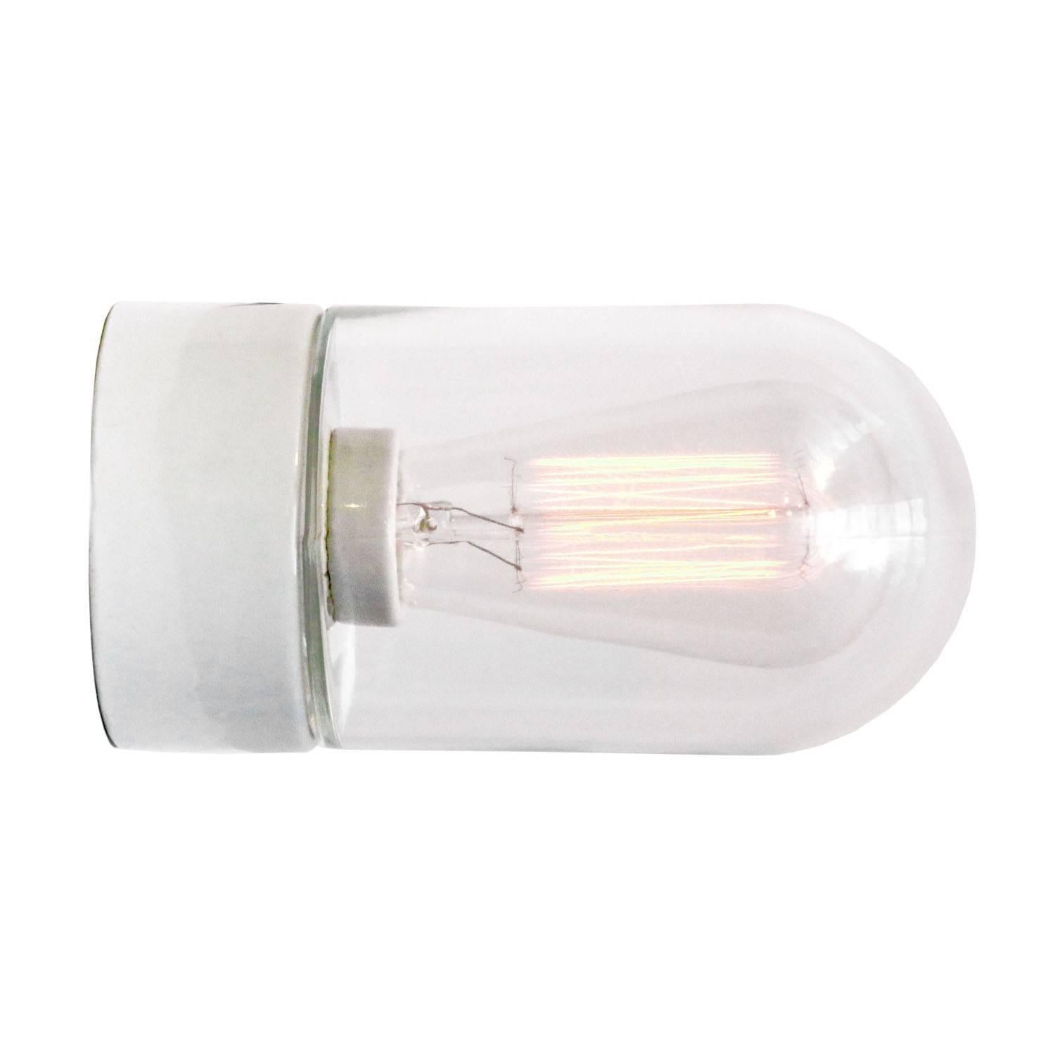 Industrial ceiling lamp. White porcelain. Clear glass.
Two conductors. No ground.

Weight: 0.8 kg / 1.8 lb

Priced per individual item. All lamps have been made suitable by international standards for incandescent light bulbs, energy-efficient and