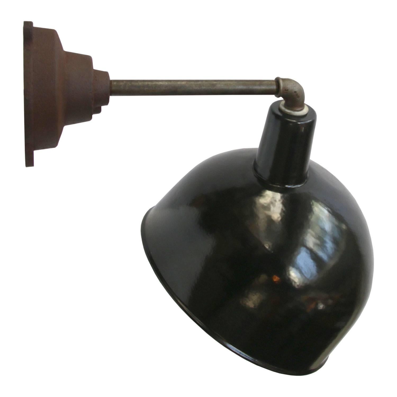 Factory wall light. Black enamel. White interior.
Diameter cast iron wall piece: 12 cm. 3 holes to secure.

Weight: 3.1 kg / 6.8 lb

All lamps have been made suitable by international standards for incandescent light bulbs, energy-efficient and LED