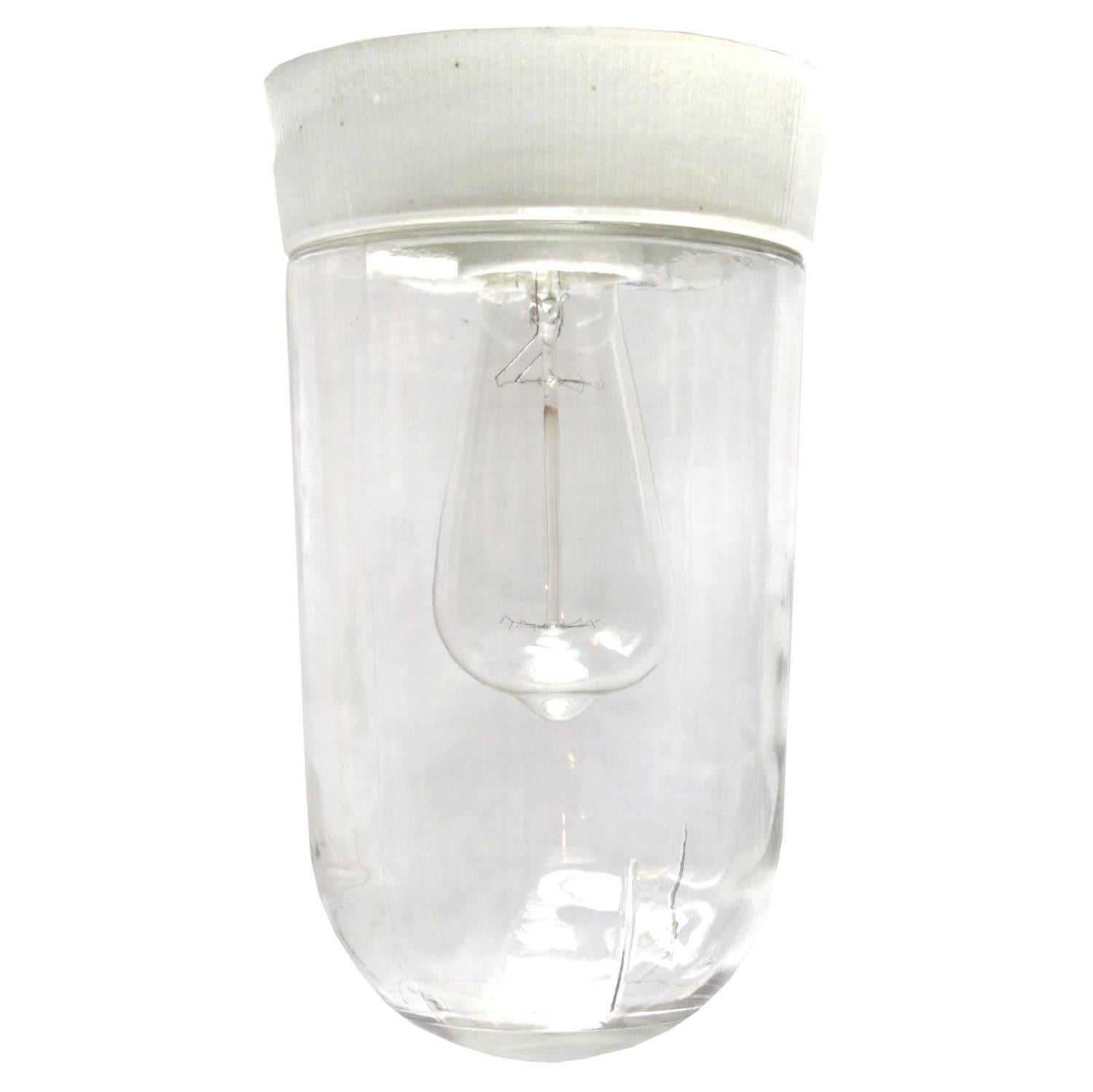 White porcelain. Clear glass.
Two conductors. No ground.

Measure: Weight 1.5 kg / 3.3 lb

Priced per individual item. All lamps have been made suitable by international standards for incandescent light bulbs, energy-efficient and LED bulbs. E26/E27