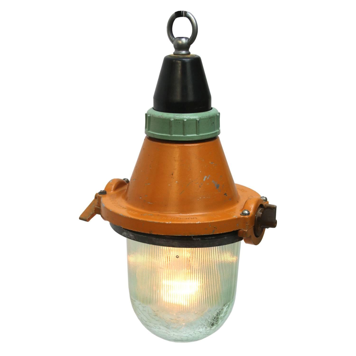 Small yellow Industrial light with Holophane glass. 

Weight: 1.5 kg / 3.3 lb

All lamps have been made suitable by international standards for incandescent light bulbs, energy-efficient and LED bulbs. E26/E27 bulb holders and new wiring are CE