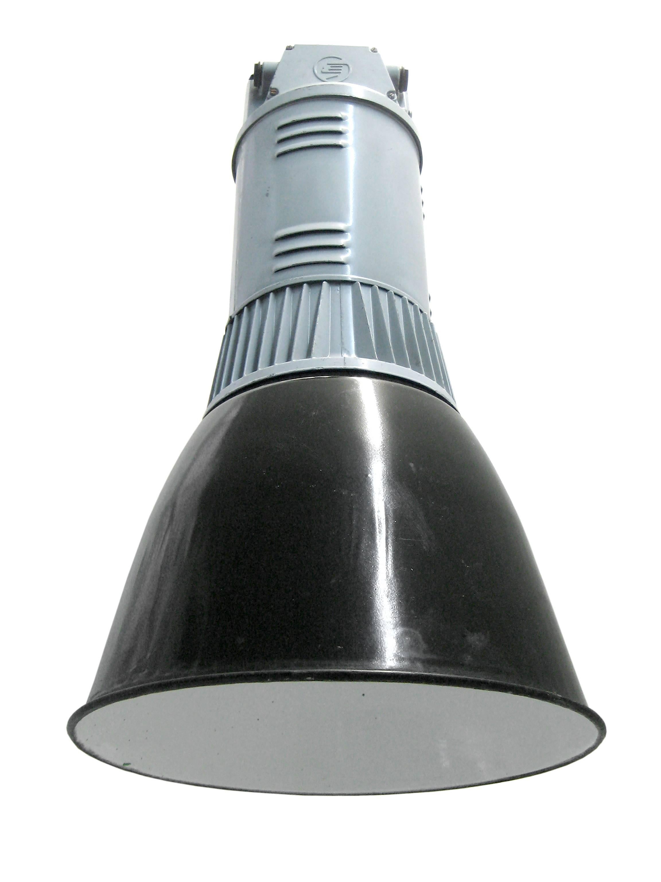 Industrial hanging lamp. Black enamel shade. Gray cast aluminium top.

Weight: 7.0 kg / 15.4 lb

Priced per individual item. All lamps have been made suitable by international standards for incandescent light bulbs, energy-efficient and LED bulbs.