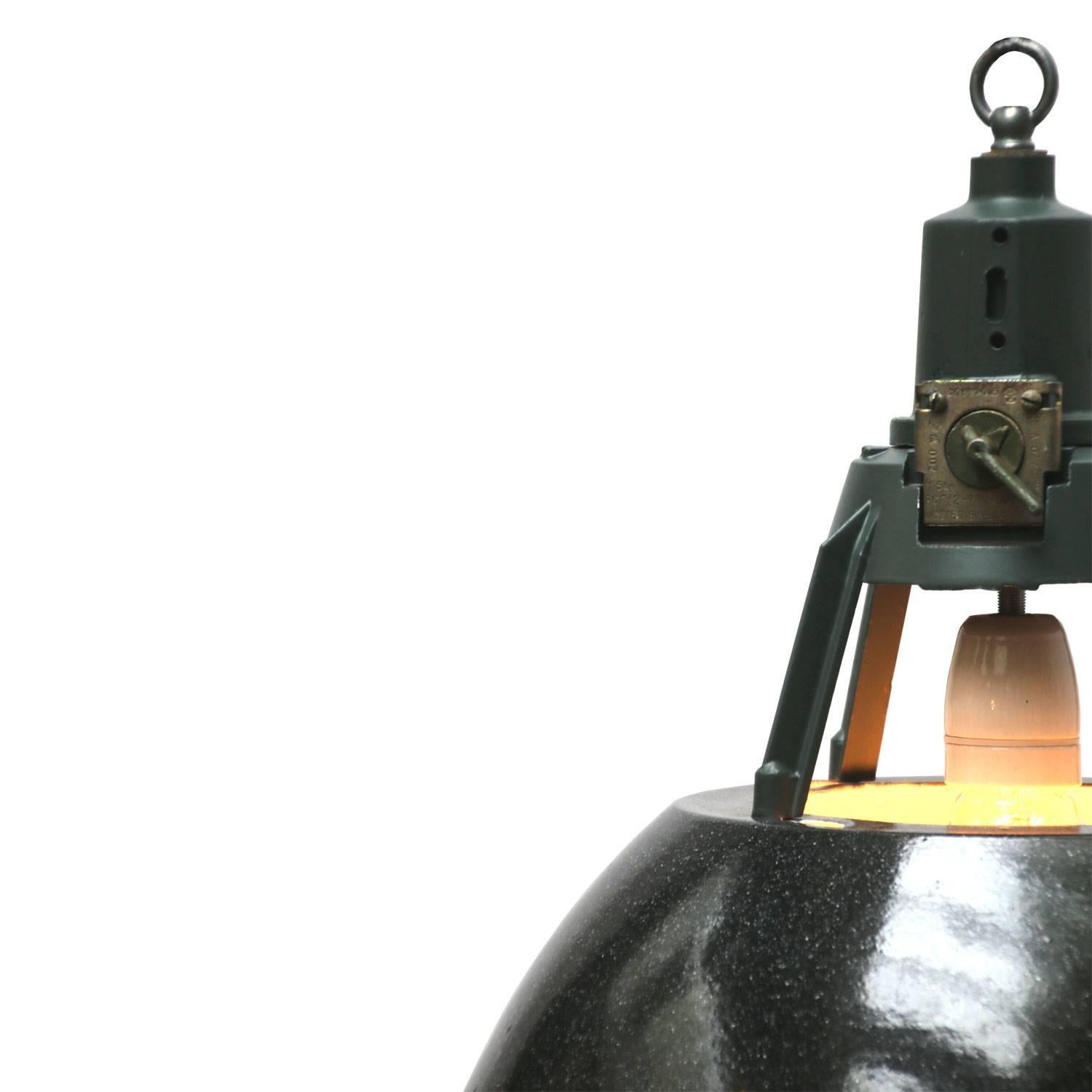 Enamel industrial pendant. Grey enamel shade. White inside.
Dark grey / green cast aluminium top.

Weight: 4.0 kg / 8.8 lb

Priced individual item. All lamps have been made suitable by international standards for incandescent light bulbs,