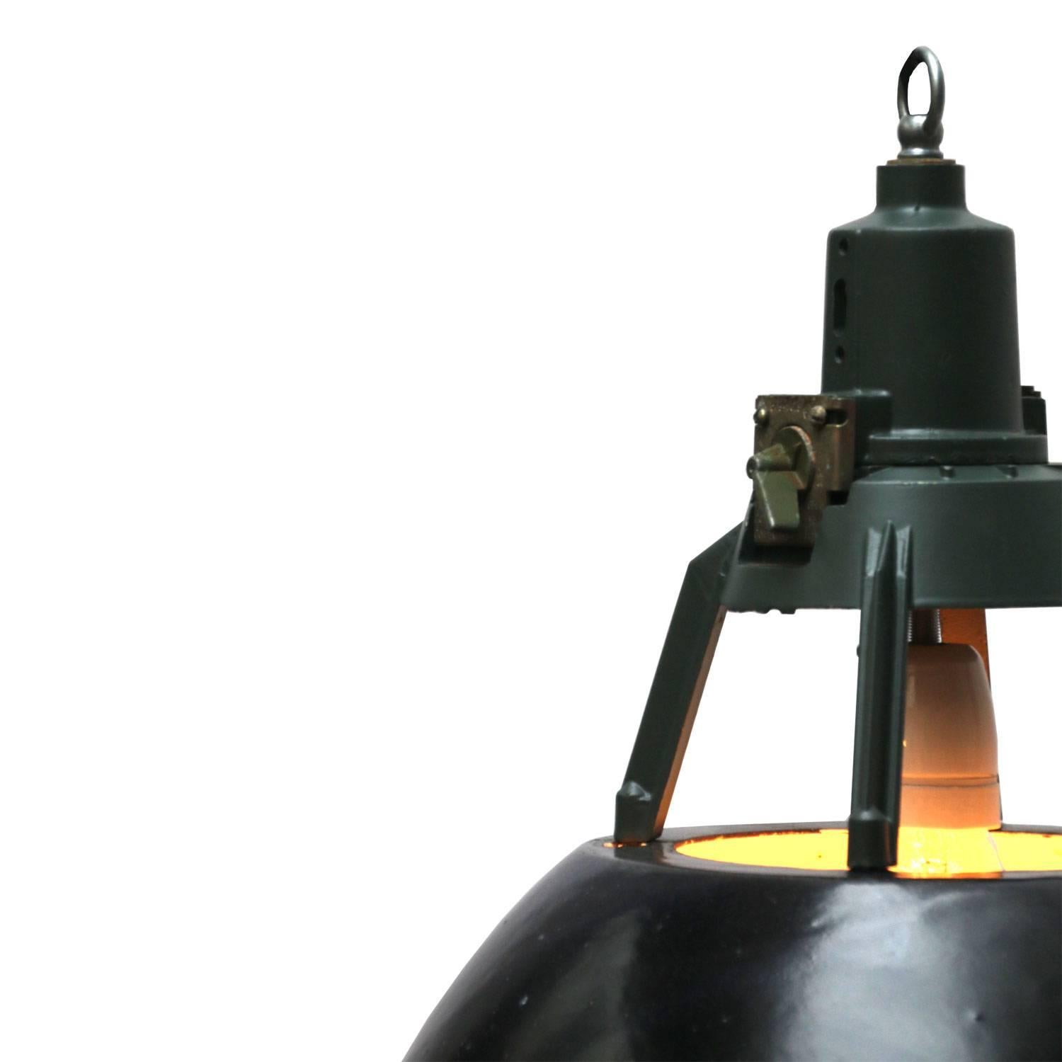 Enamel industrial pendant. Black enamel shade.
White inside. Dark gray / green cast aluminum top.

Weight: 4.0 kg / 8.8 lb

All lamps have been made suitable by international standards for incandescent light bulbs, energy-efficient and LED bulbs.