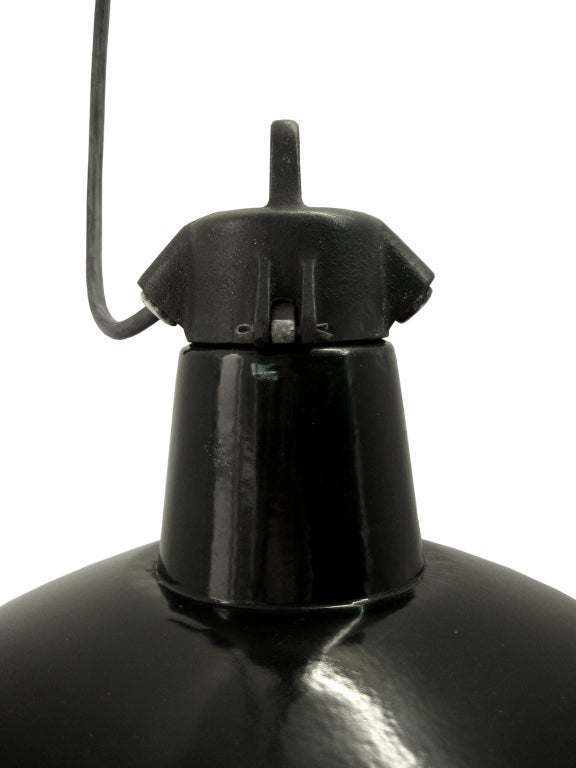 Industrial lamp black enamel. White interior cast, iron top. European Industrial Bauhaus Classic. Used in warehouses and factories.

Weight: 2.0 kg / 4.4 lb

All lamps have been made suitable by international standards for incandescent light