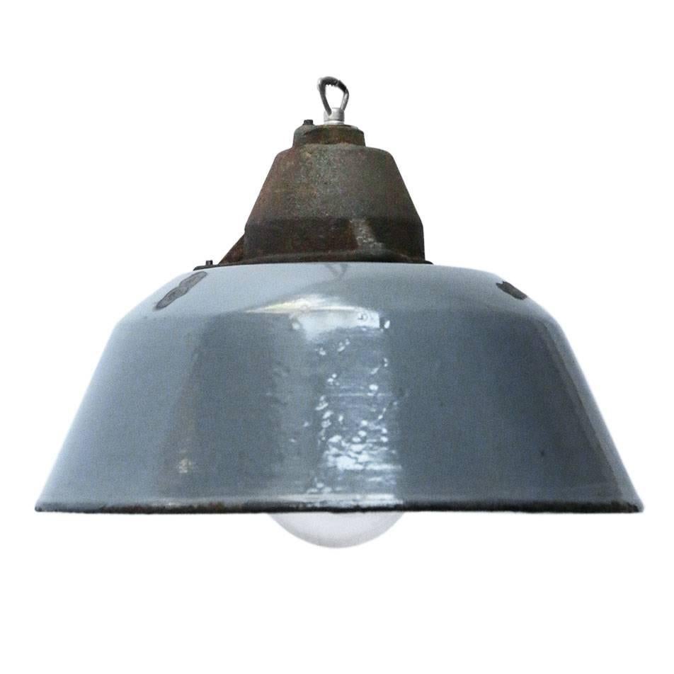 Factory pendant. Blue grey enamel white interior. Cast iron top with clear glass.

Measures: Weight 3.4 kg / 7.5 lb

All lamps have been made suitable by international standards for incandescent light bulbs, energy-efficient and LED bulbs. E26/E27