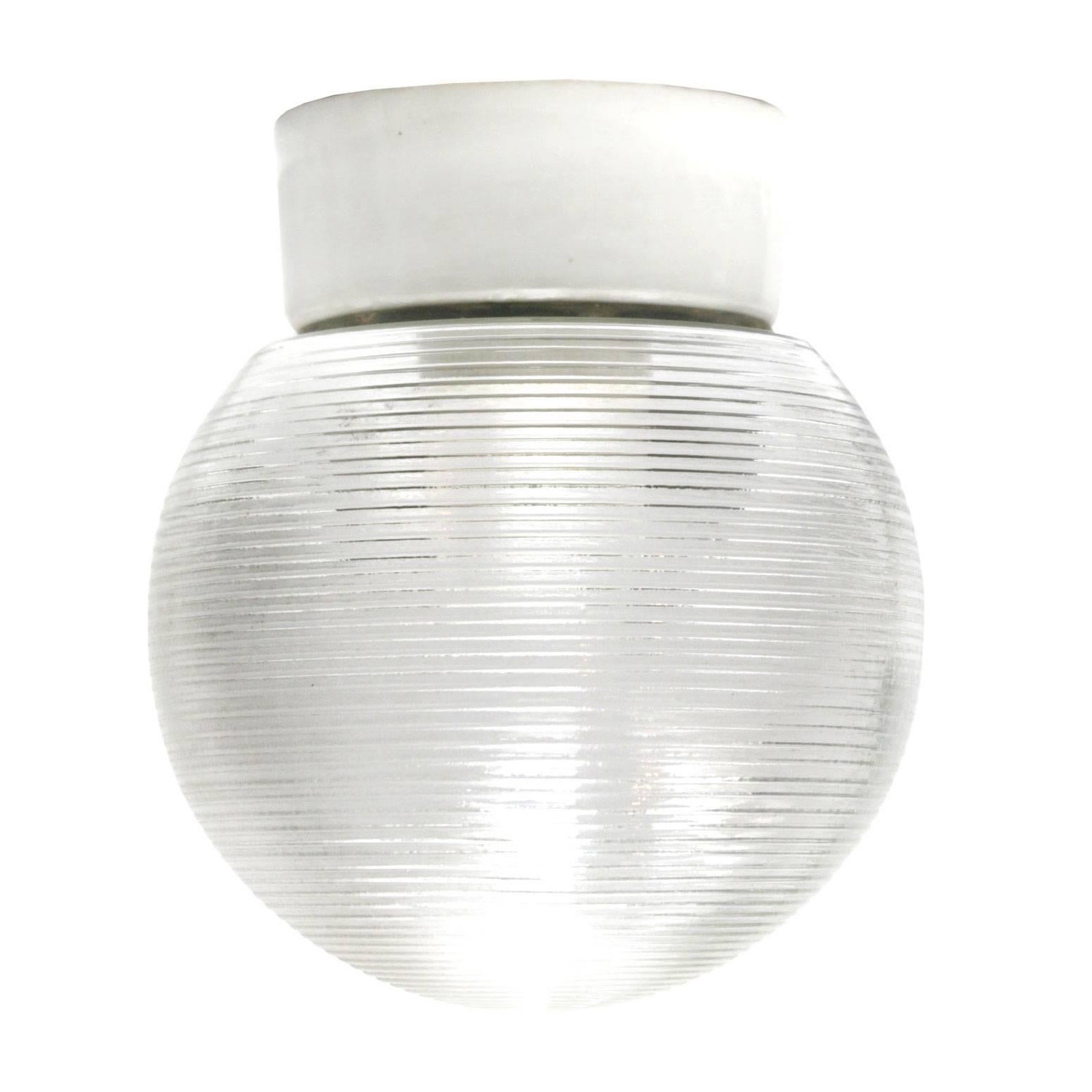 Industrial ceiling lamp. White porcelain. Striped glass.
Two conductors. No ground.

Weight: 1.5 kg / 3.3 lb

Priced individual item. All lamps have been made suitable by international standards for incandescent light bulbs, energy-efficient
