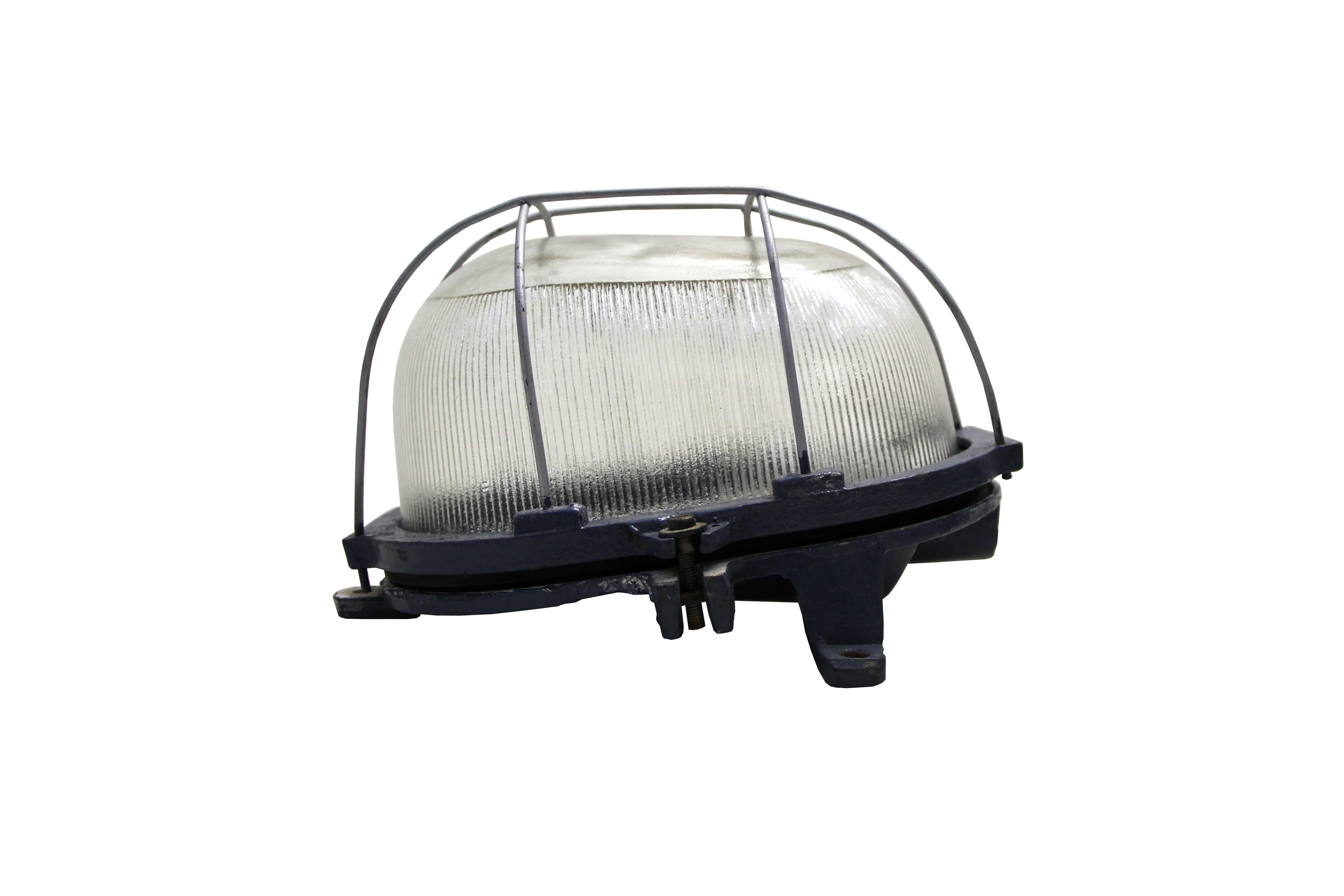 Wall lamp scone, cast iron, Holophane glass clear. Also for use outdoors. 

Weight 5.50 kg / 12.1 lb

Priced per individual item. All lamps have been made suitable by international standards for incandescent light bulbs, energy-efficient and LED