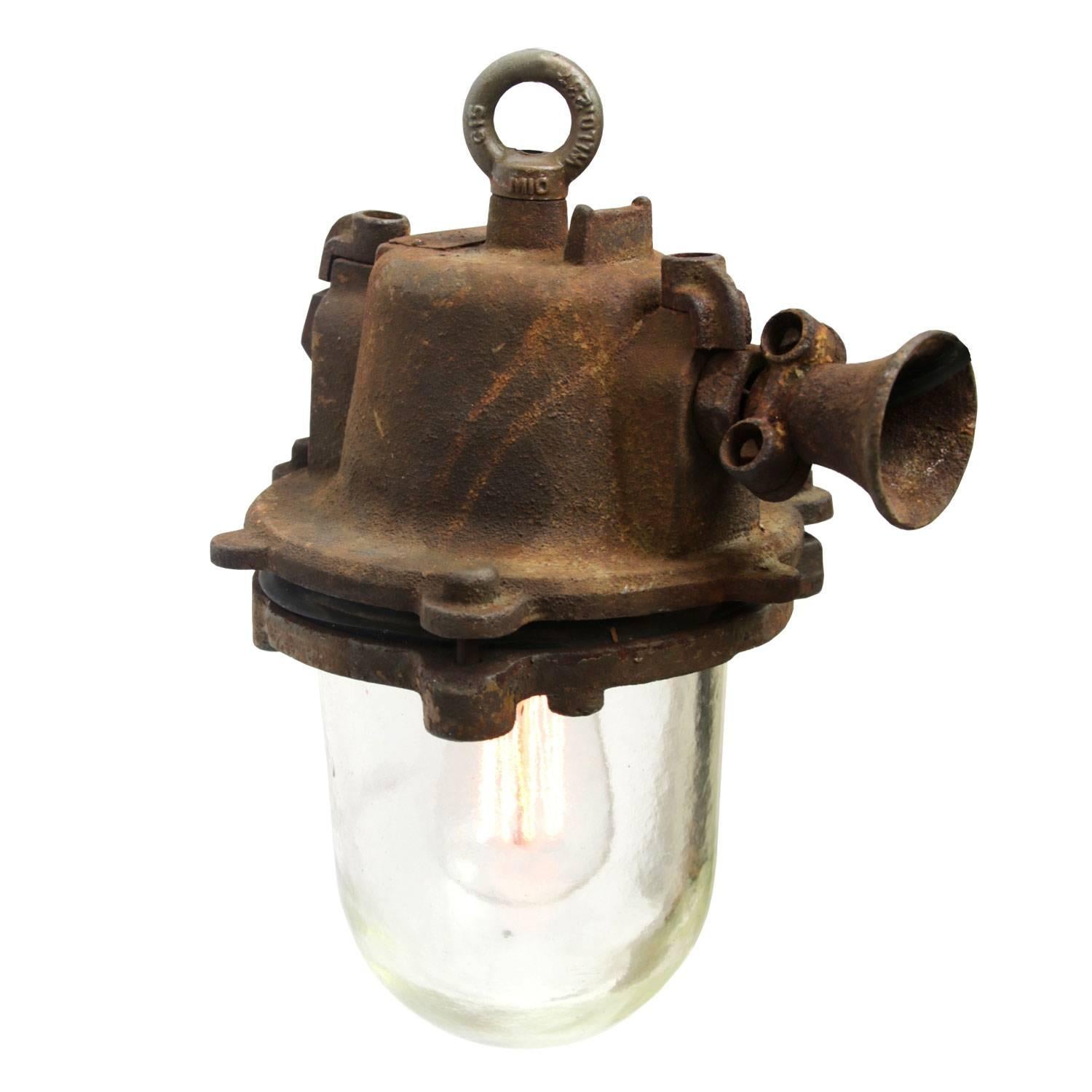 Vintage European Industrial hanging lamp. Cast iron with clear glass. 

Weight 9.5 kg / 20.9 lb

All lamps have been made suitable by international standards for incandescent light bulbs, energy-efficient and LED bulbs with an E27 socket, max