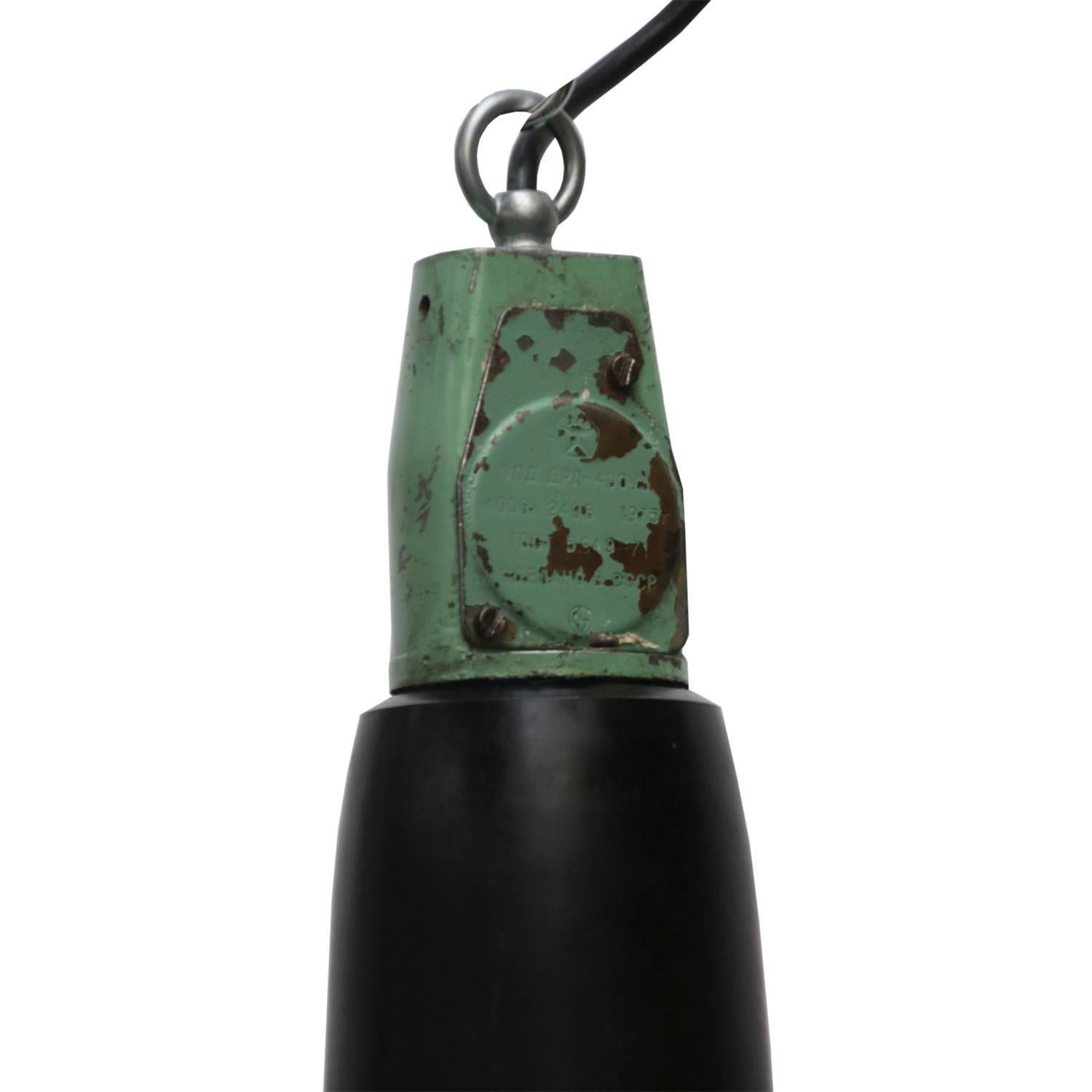 Olesko large. Enamel Industrial pendant. Green enamel shade, white inside.
Bakelite top.

All lamps have been made suitable by international standards for incandescent light bulbs, energy-efficient and LED bulbs with an E26/E27 socket, new wiring