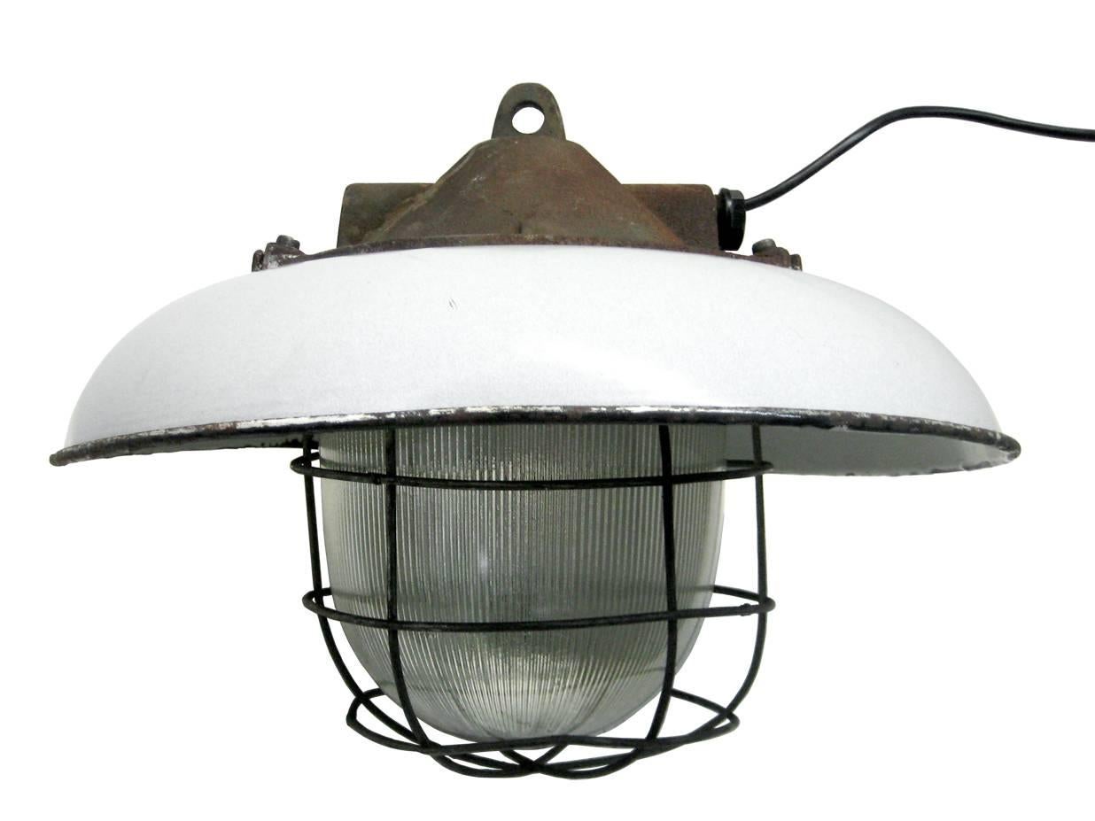 Industrial factory pendant. White enamel shade.
Cast iron top. Holophane glass.

Weight: 6.0 kg / 13.2 lb

Priced per individual item. All lamps have been made suitable by international standards for incandescent light bulbs, energy-efficient and