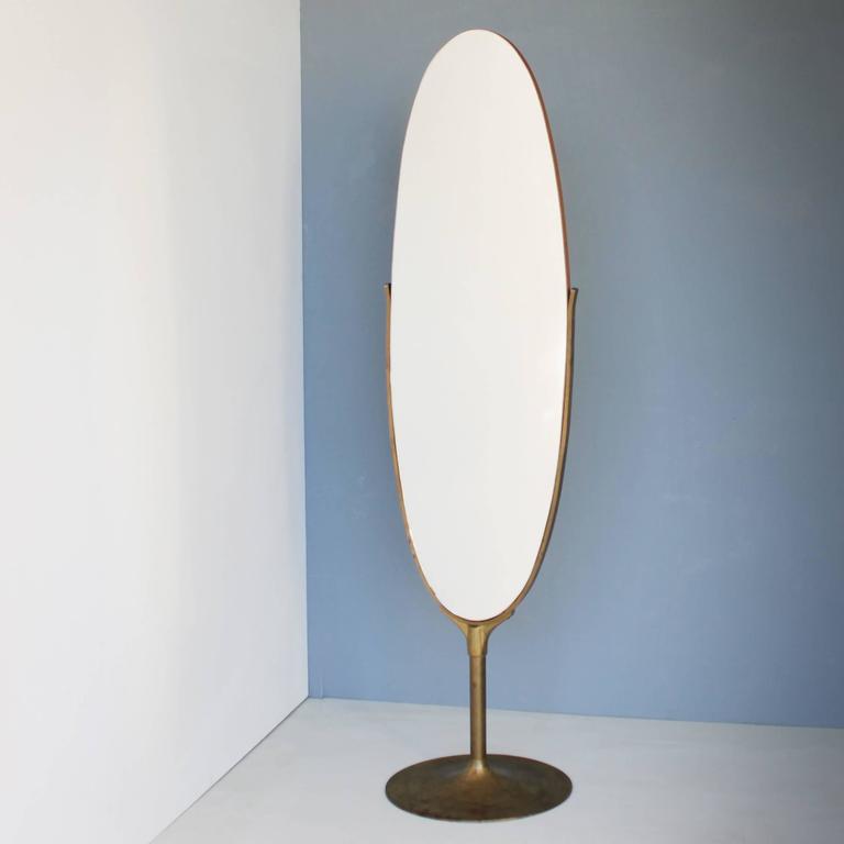 Oval Dressing Mirror with a Brass Frame at 1stDibs