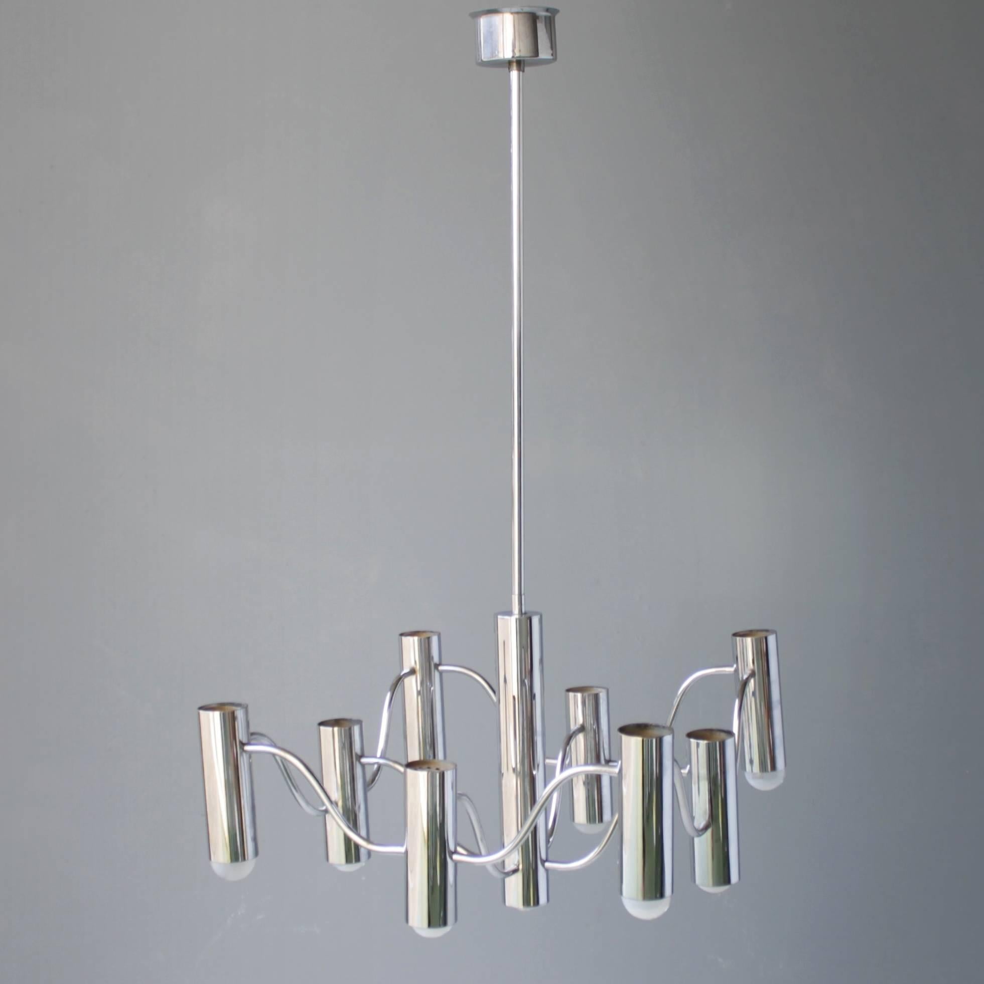 Chrome chandelier by Gaetano Sciolari with eight lights. Total height: 35.8 in. (91 cm), diameter 18.9 inches (48 cm).
Though the Sciolari company was founded in Rome in the 1890s, the name Sciolari only attracted international attention more than