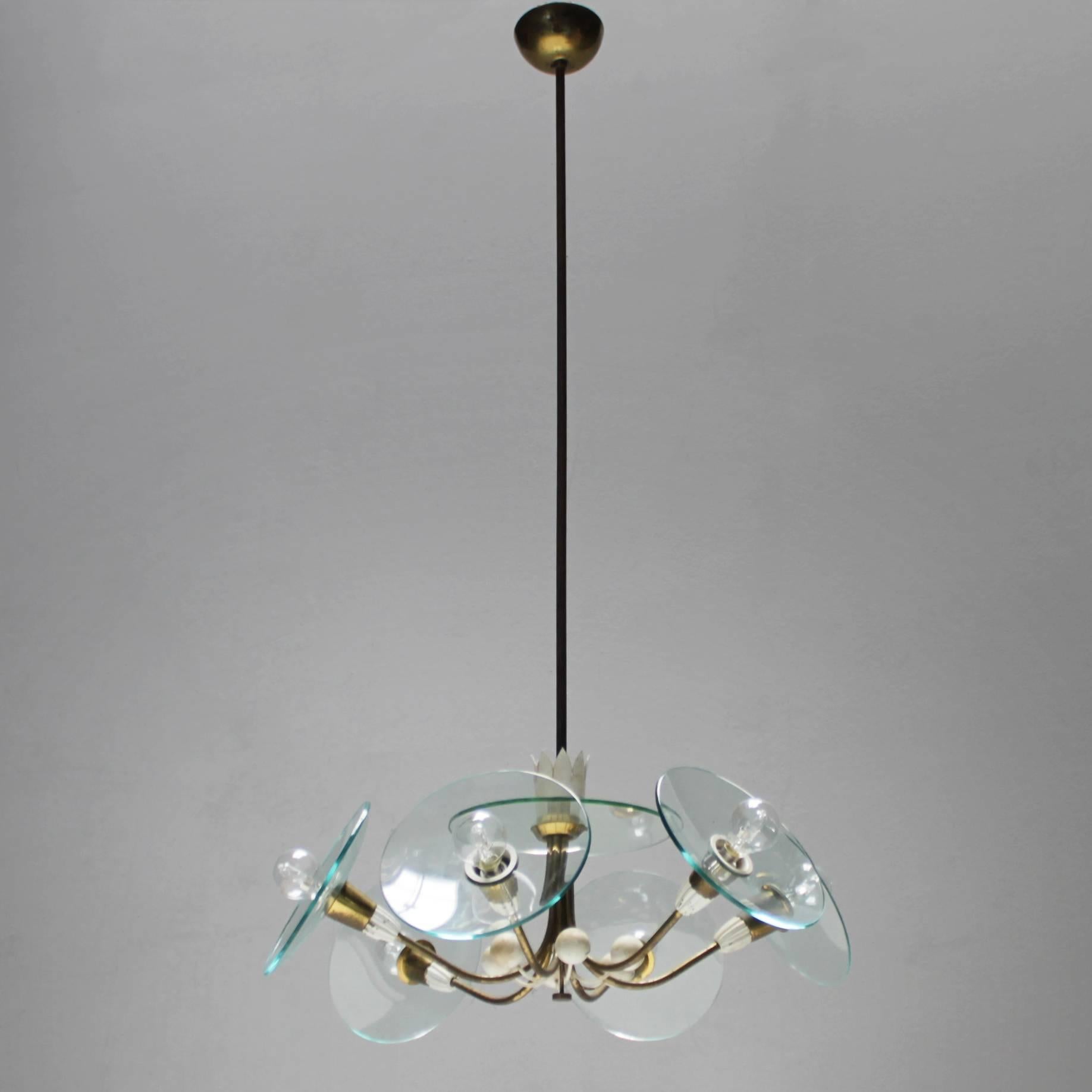 Chandelier in the style of Pietro Chiesa for Fontana Arte Italy. Rewired but in a beautiful original condition.
Measurements: height from ceiling till drop: 41.7 in. (106 cm), diameter: 22.0 in.(56 cm). Diameter glass 8.2 in. (21 cm), length rod: