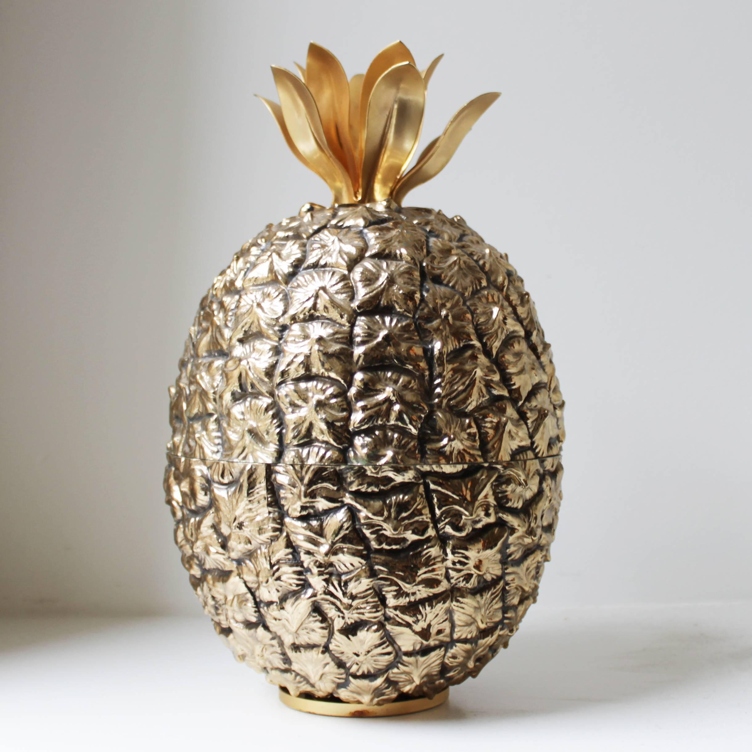 French signed pineapple shaped ice bucket. Gold toned anodized aluminum (exterior) and plastic (interior bucket). Beautiful condition. Marked: Michel Dartois, Paris.
