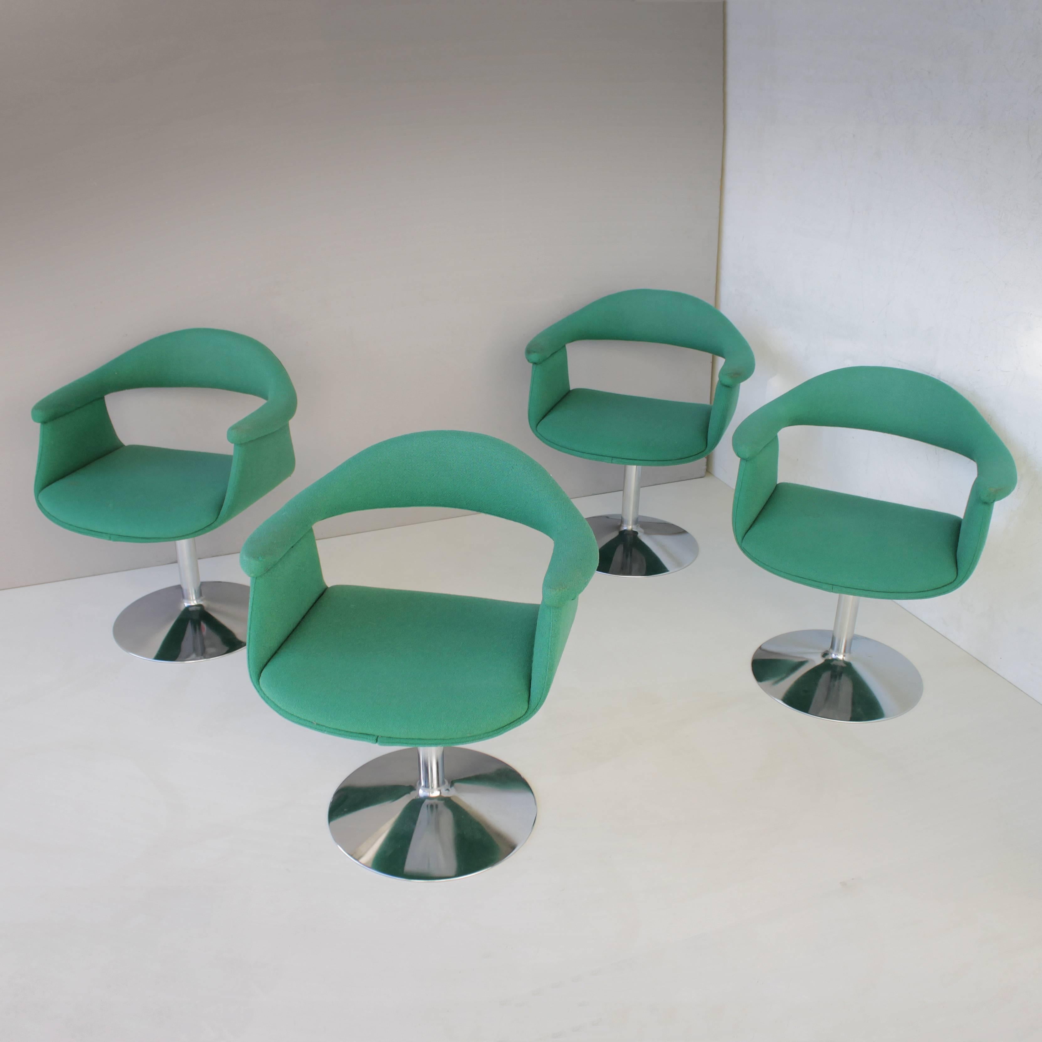 A very rare set of six (6) swivel chairs by Eero Aarnio for Asko Lahti Finland. Model: Forelli 8565 (1966), also known as Captain's chairs. Chromed metal swivel base and sea green woolen upholstery. The upholstery is a bit worn out at the end of the