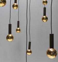Huge Chandelier with Twelve Gold Colored Light Bulbs