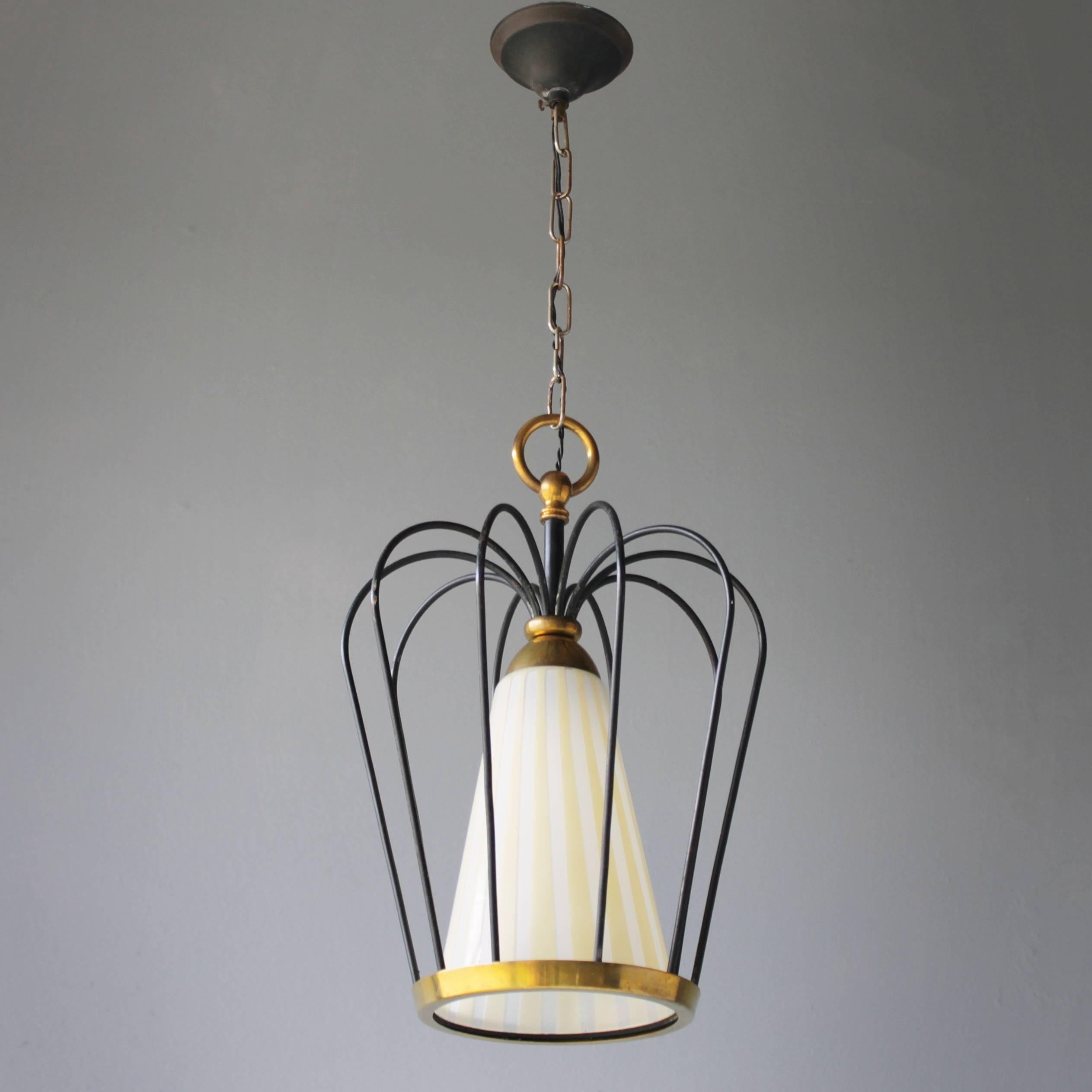 Italian pendant in the style of Stilnovo. 
One bulb E27/E26 of max 60 watt, the electricity is used but in a good condition, approved to European standards. Works in the USA.
Dimensions: From ceiling till drop: 29.1 in. (74 cm), height light: 12.6
